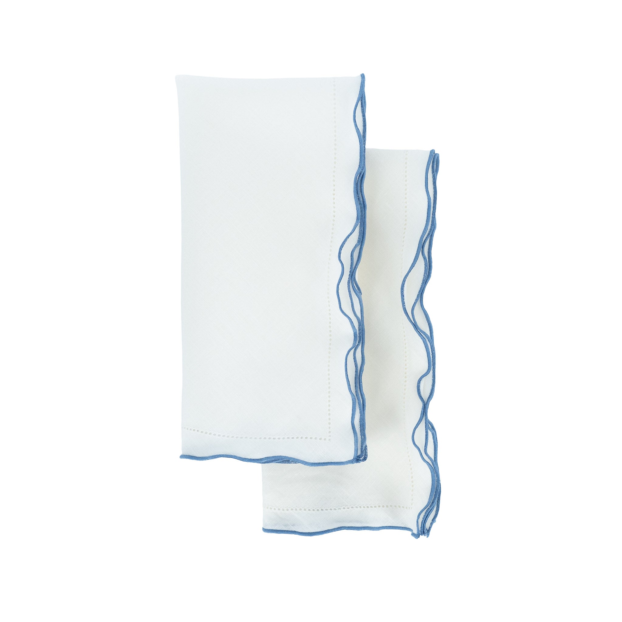 Set of 4 white linen napkins, 21x21 inches, with blue ruffled hemstitch edges for a chic dining experience.