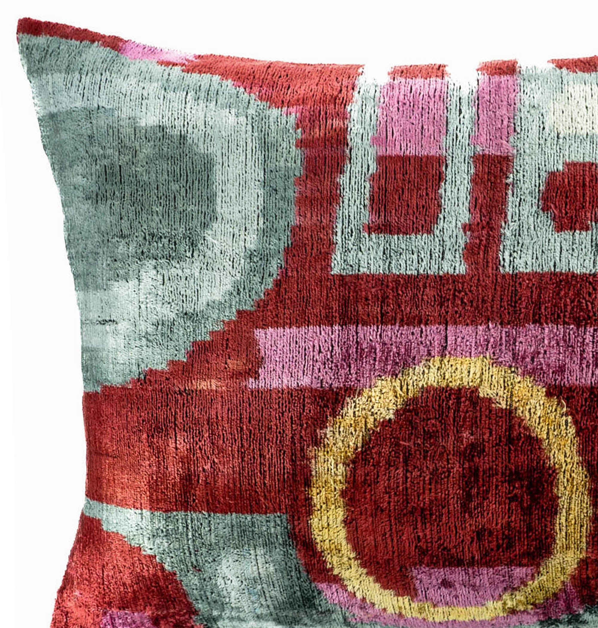 Chouchou Touch Pippa Ikat throw pillow cover, crafted from pure silk velvet with striking multicolor designs.