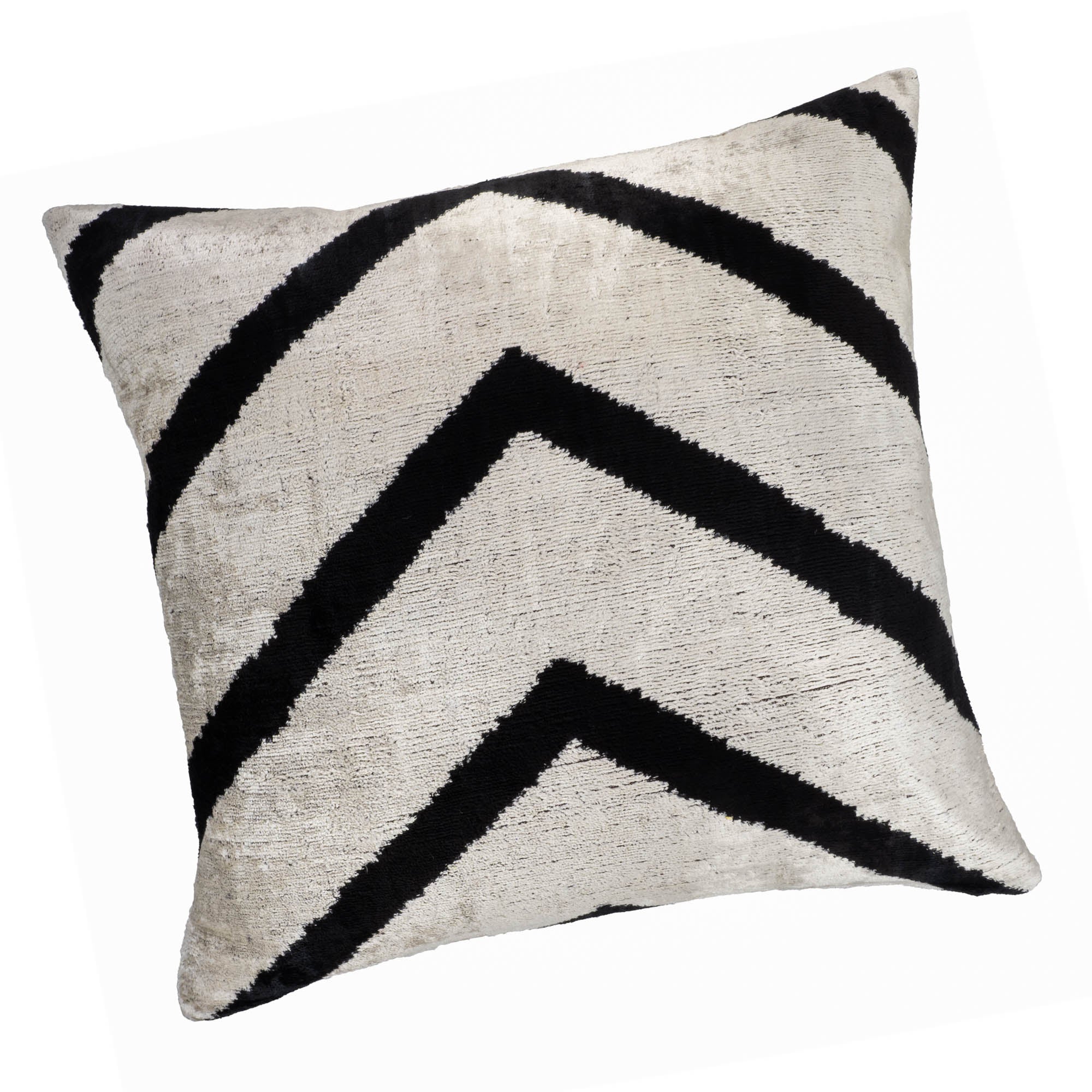 Contemporary chevron-patterned Ikat pillow cover, blending black and silver tones in high-quality silk velvet.