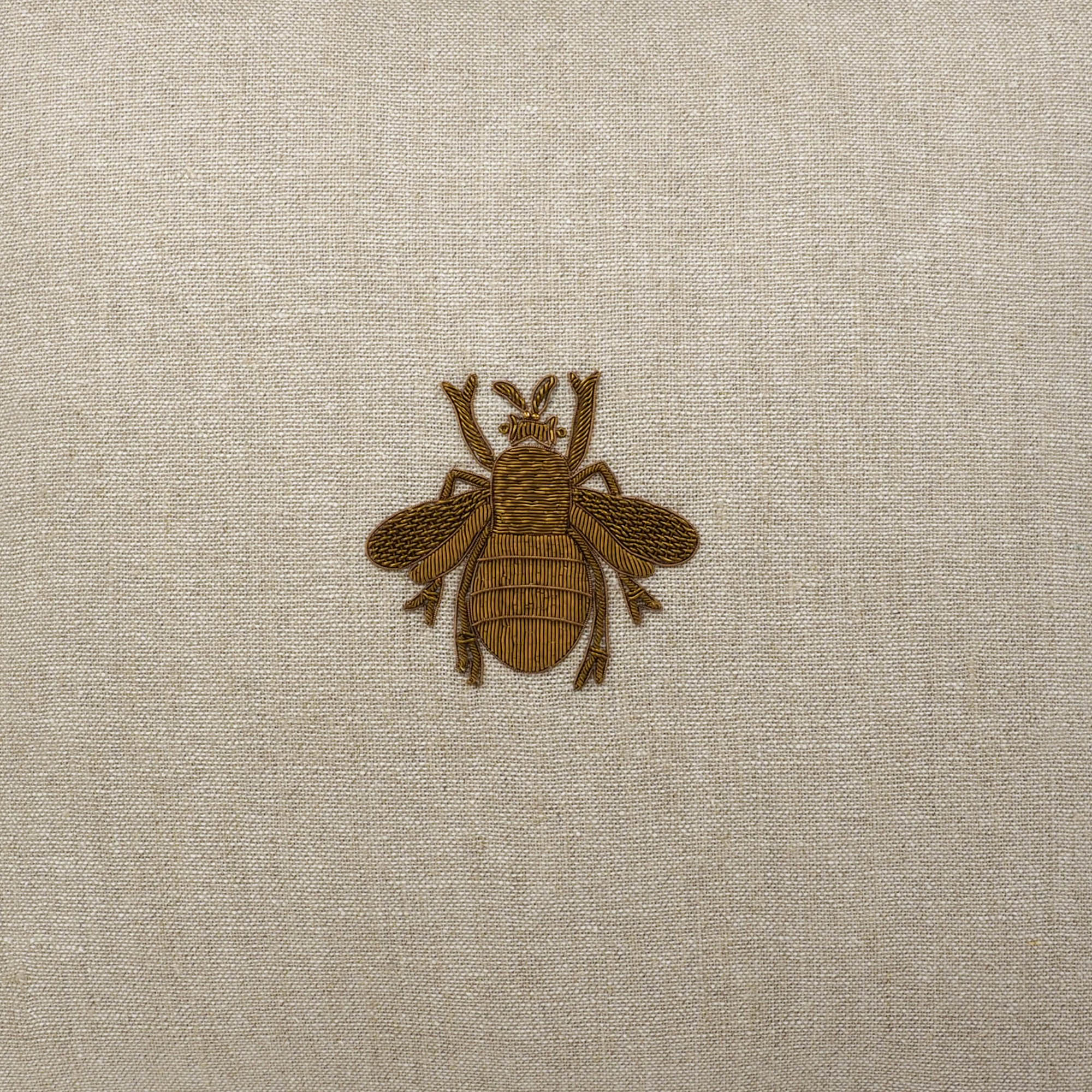 Chouchou Touch 19x19 linen cushion cover featuring a gold thread bee design.