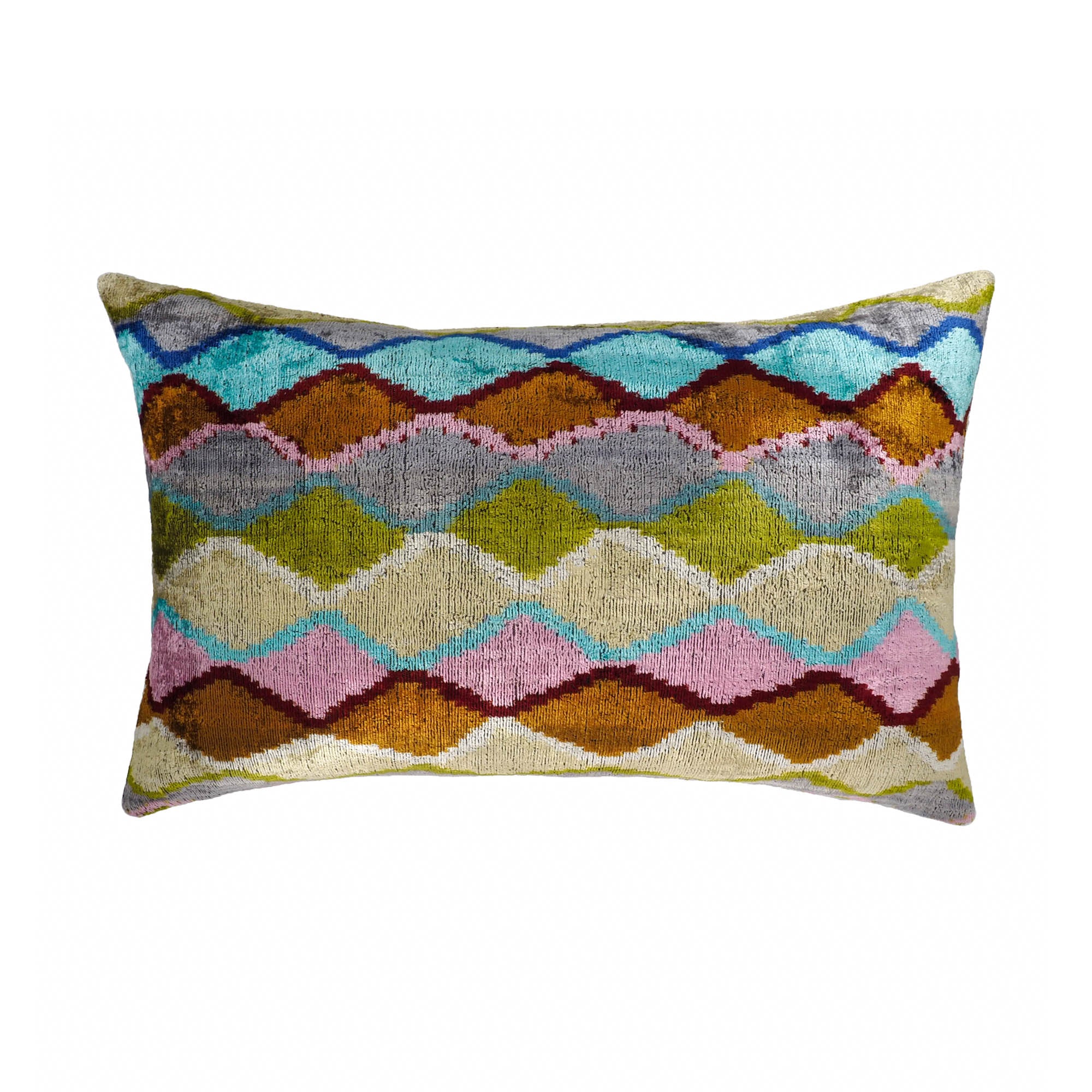Colorful silk velvet ikat throw pillow with wave-inspired chevron diamond pattern.