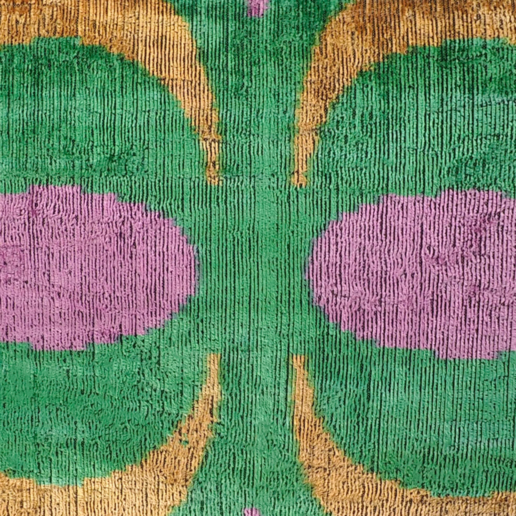 Chouchou Touch Bongo Silk Velvet Ikat Pillow, 16 x 24, designed with colorful Ikat patterns woven into premium silk velvet fabric for a chic and sophisticated accent.