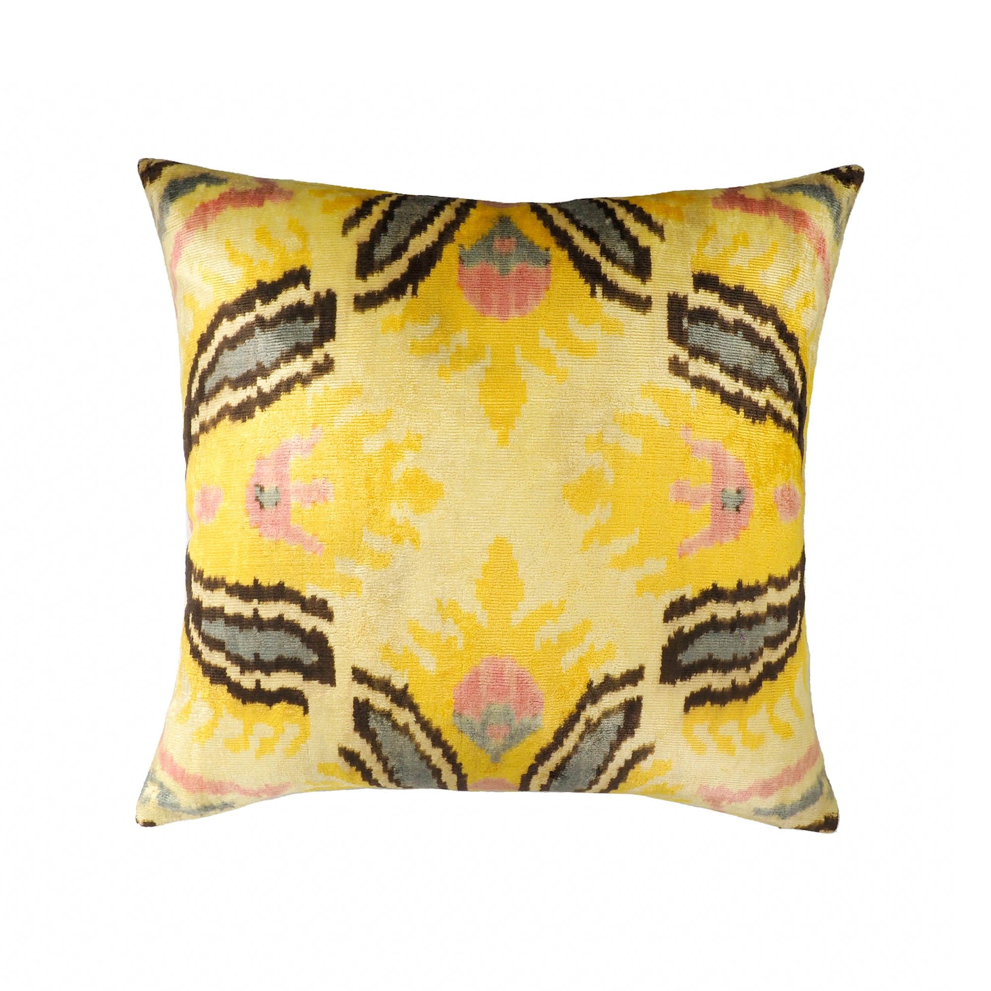 Yellow silk velvet ikat pillow with floral-inspired symmetrical design in black, pink, and gray.