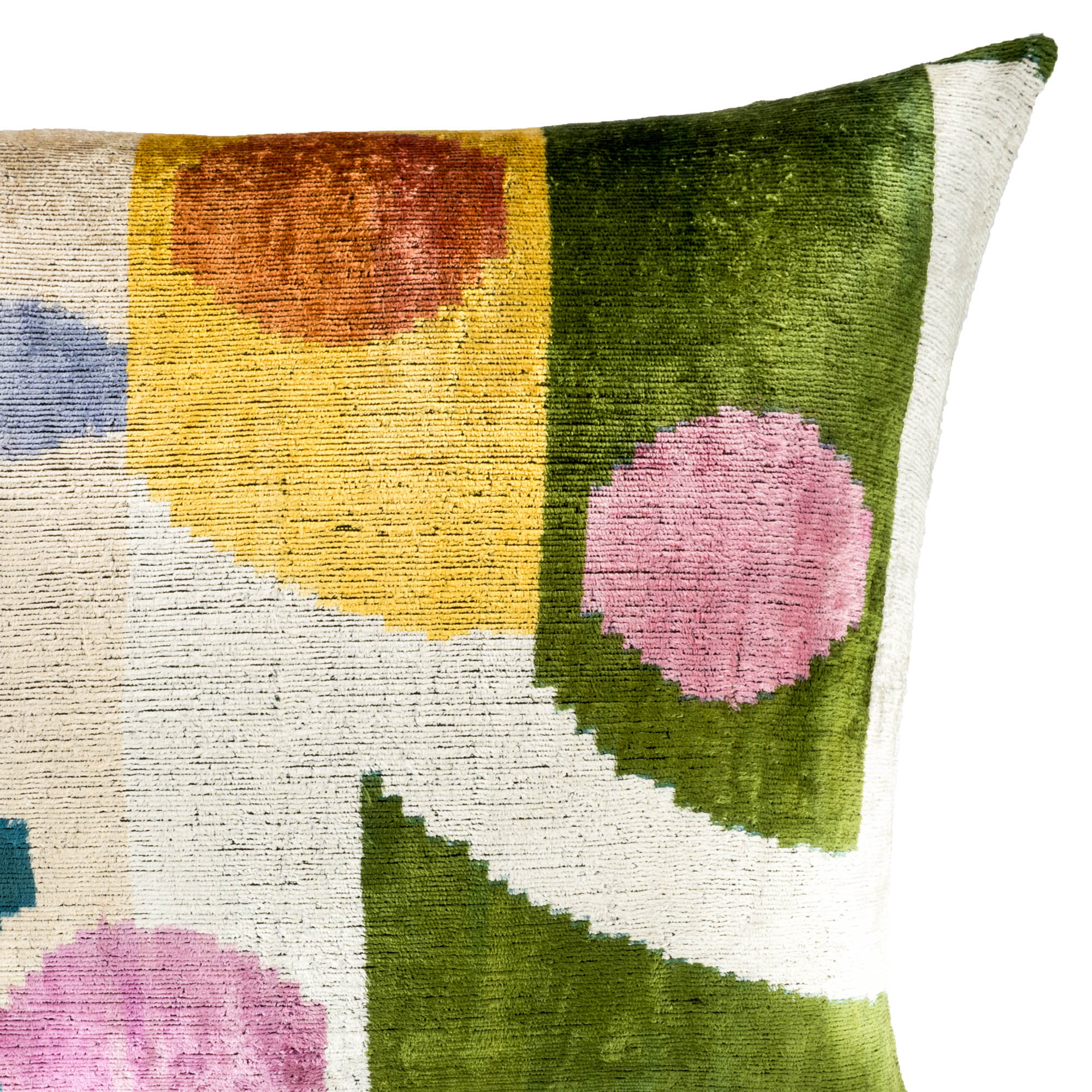 Chouchou Touch Carnival pillow cover in silk velvet, featuring playful geometric designs in rich colors like yellow, pink, and green.