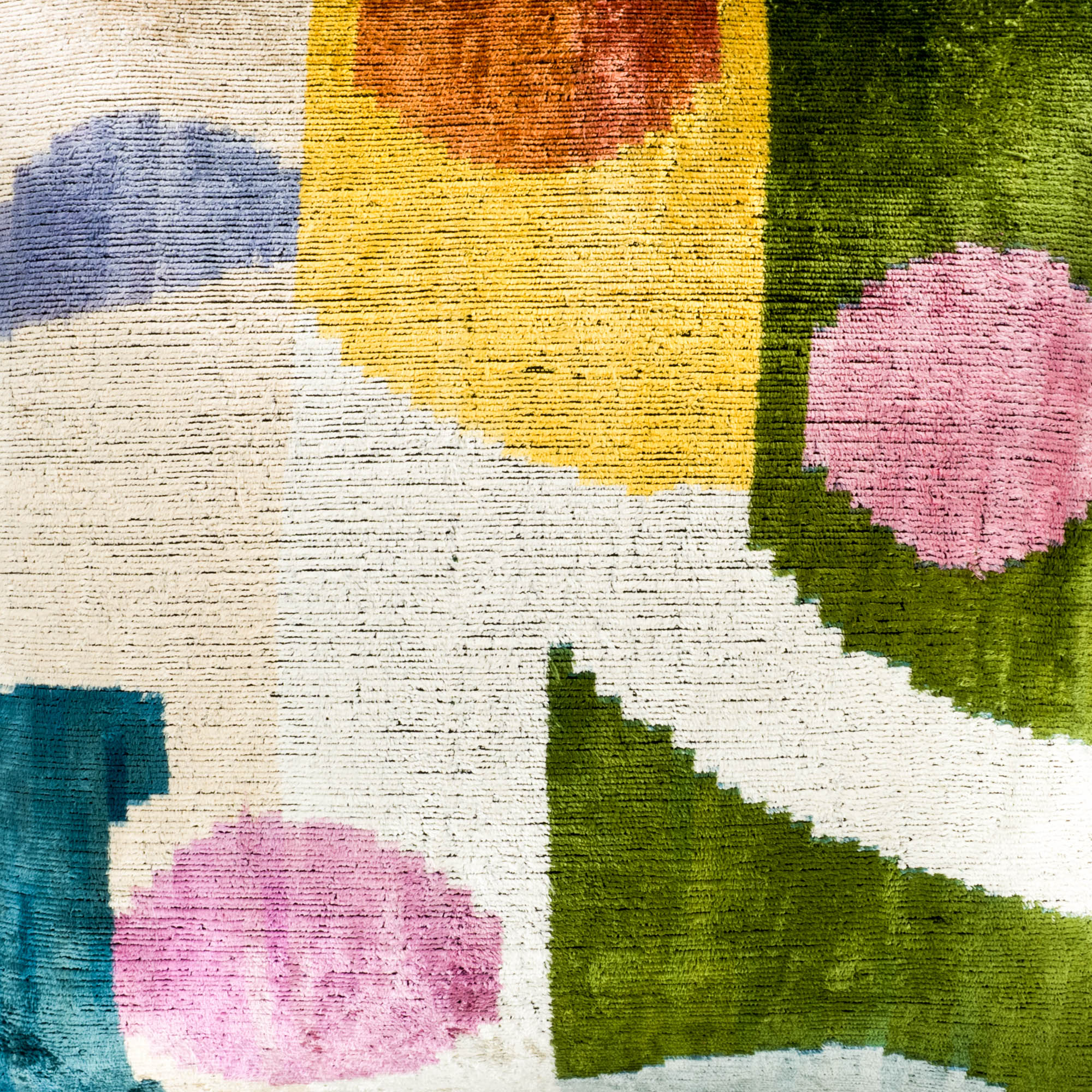 Vibrant and artistic Carnival throw pillow with colorful circular motifs and geometric designs, crafted from 100% pure silk velvet.