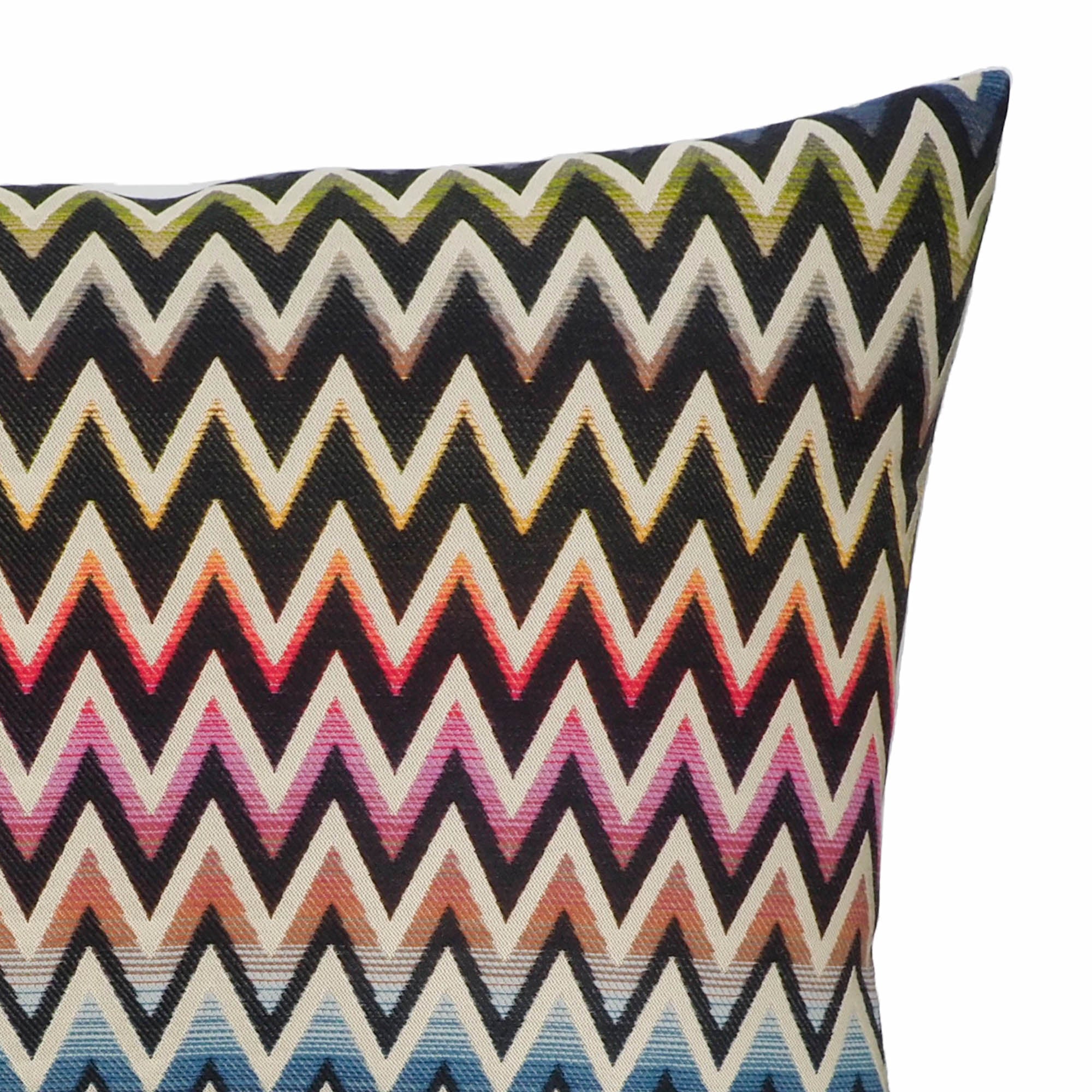 Close-up of the Chouchou Touch Chevron Pillow, showcasing a bold chevron pattern and smooth textures.