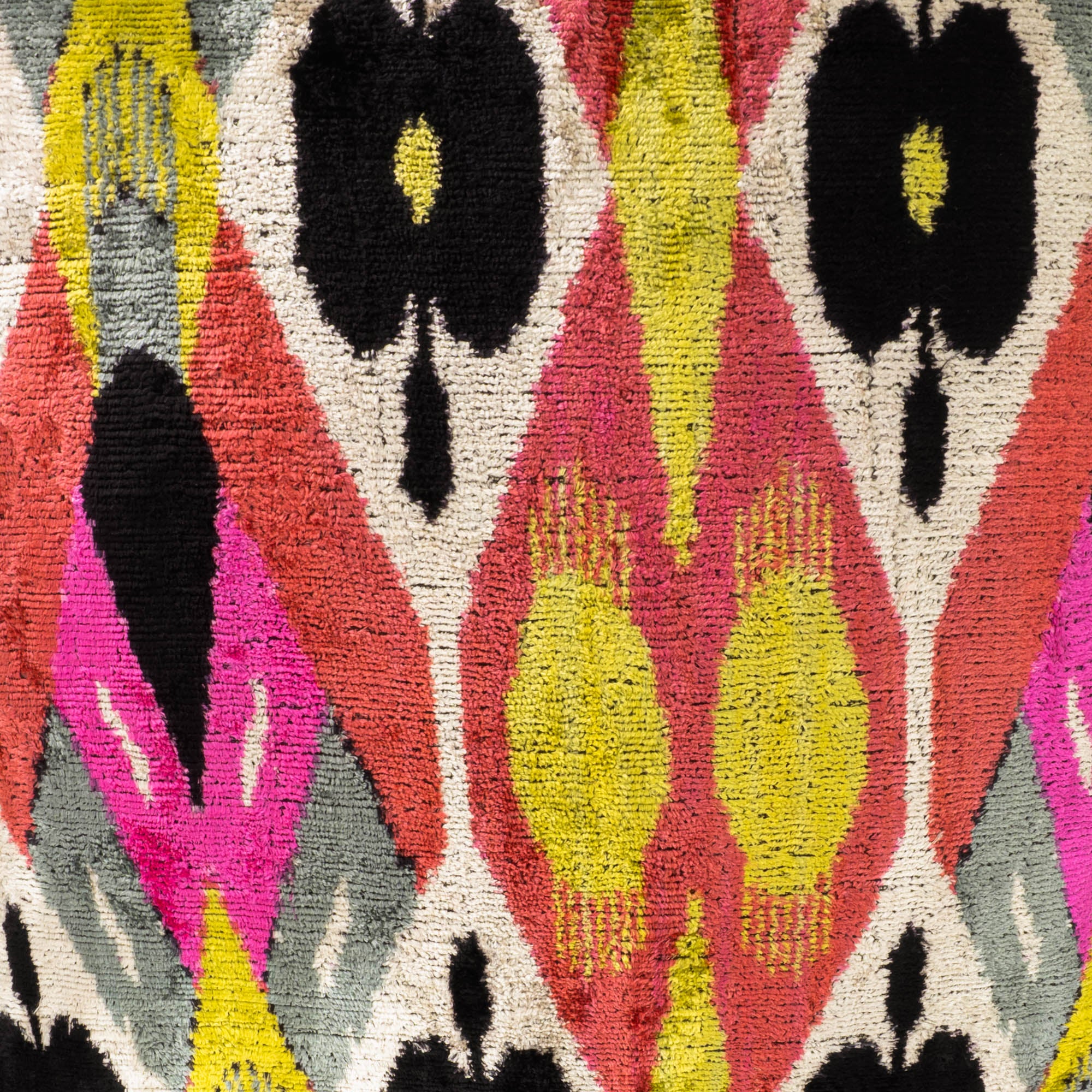 Chouchou Touch Euphora Pillow Cover, showcasing historical Ikat weaving techniques with a modern twist.