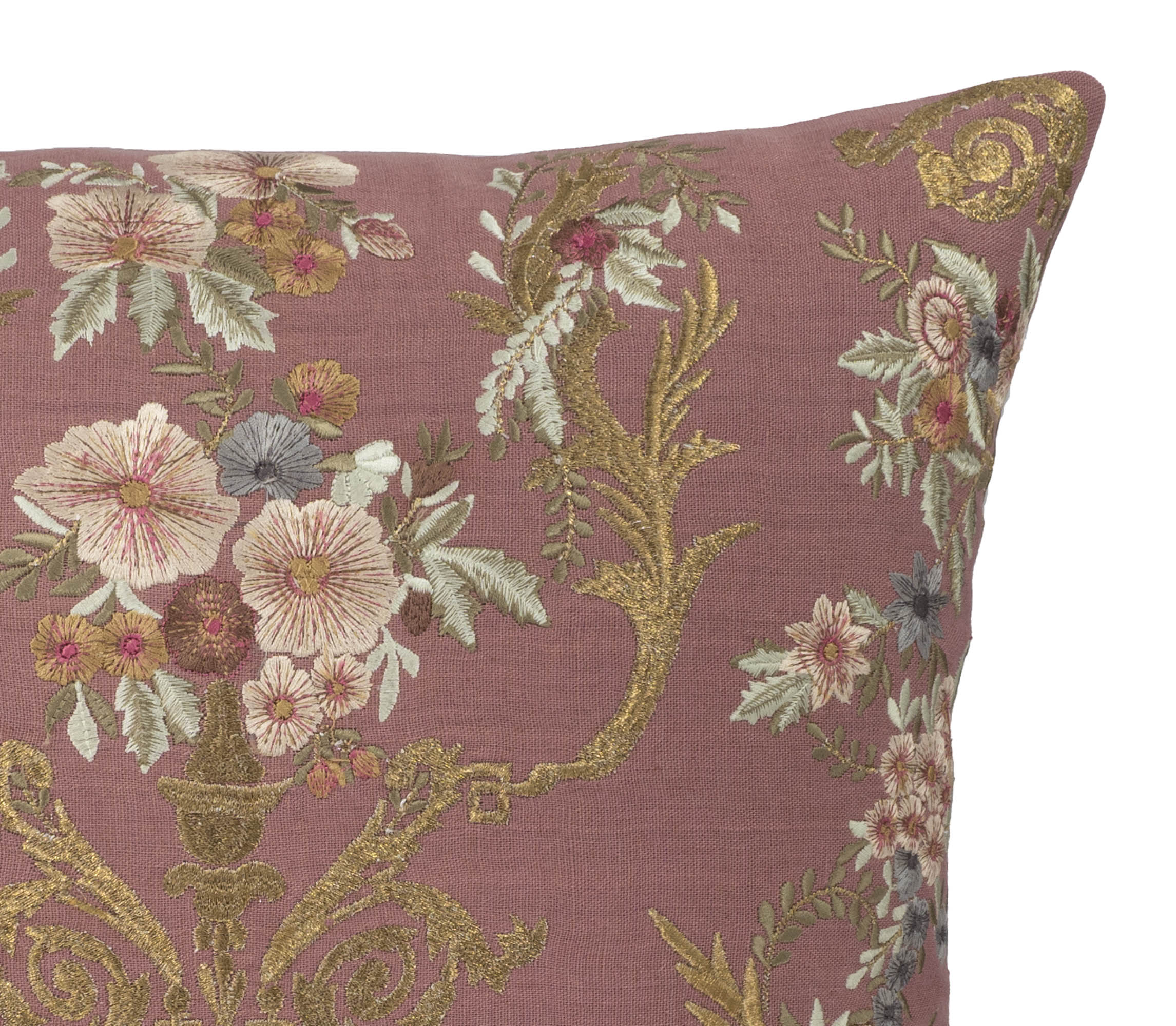 Vintage-style square pillow cover in mauve linen with intricate floral embroidery.
