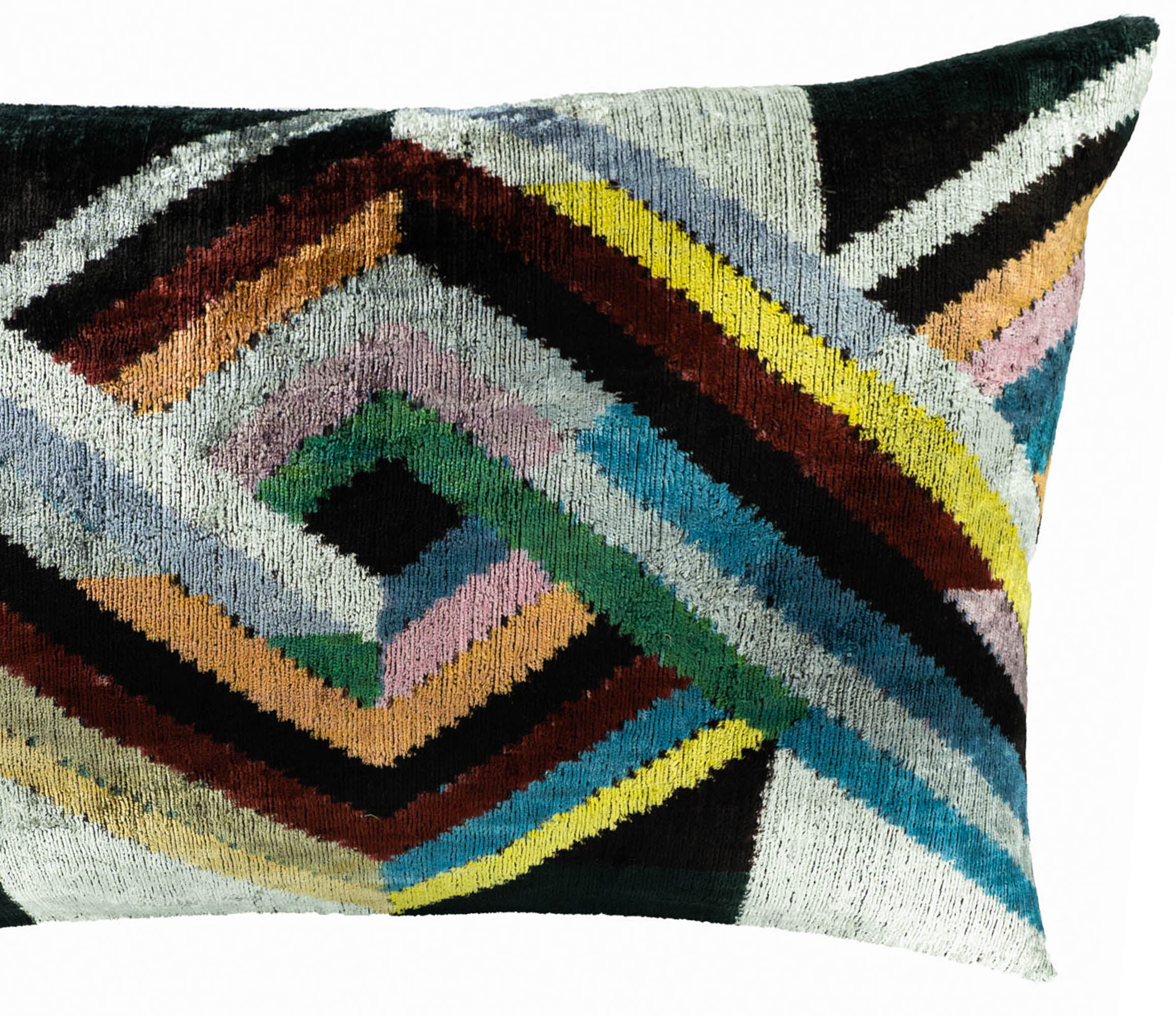Handcrafted Icarus Ikat pillow with a blend of traditional Uzbek-inspired weaving and contemporary multicolor designs.