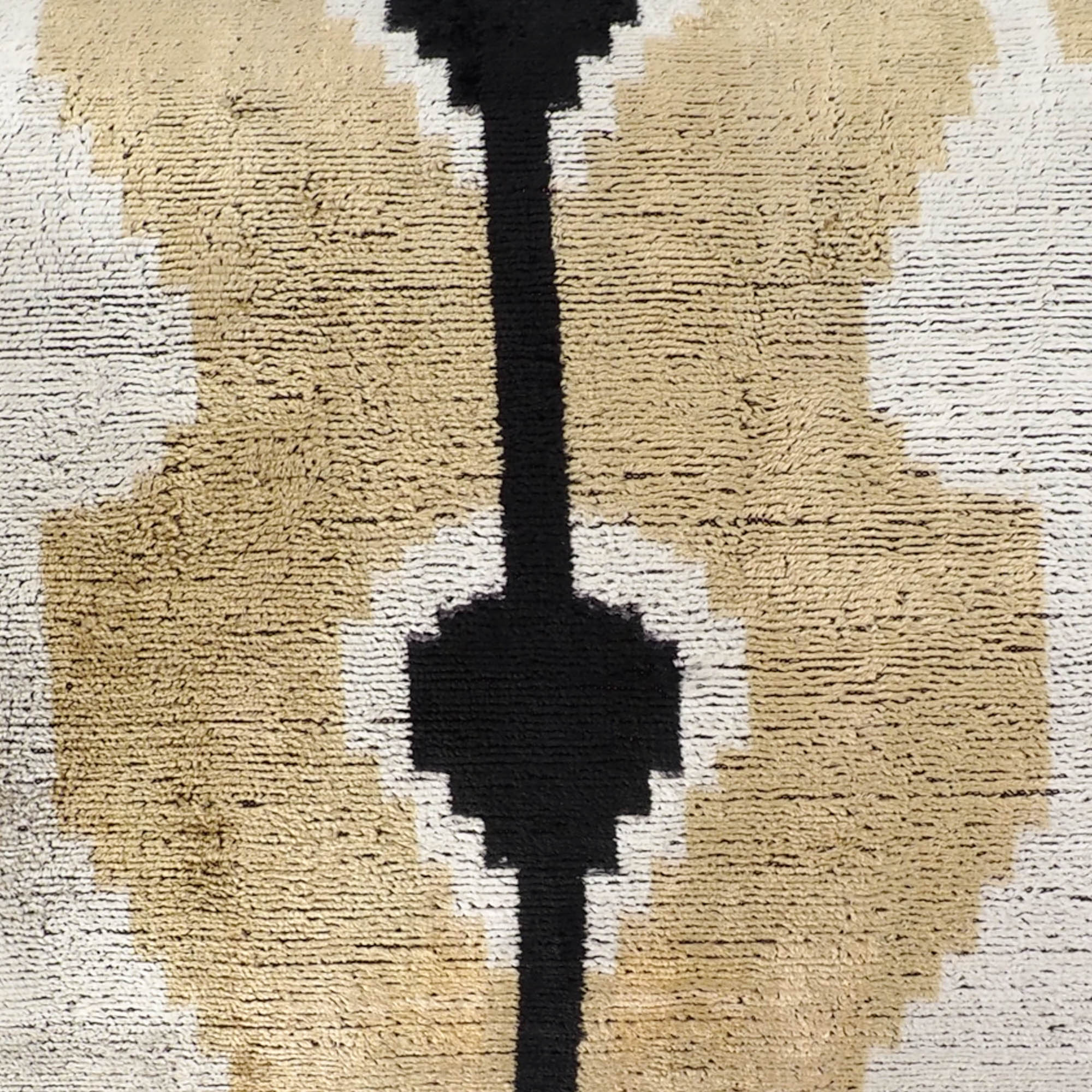 Chouchou Touch Kisses Ikat Throw Pillow Cover, 16 x 24, with a rich silk velvet texture and striking Ikat patterns, bringing elegance and color to your living room.