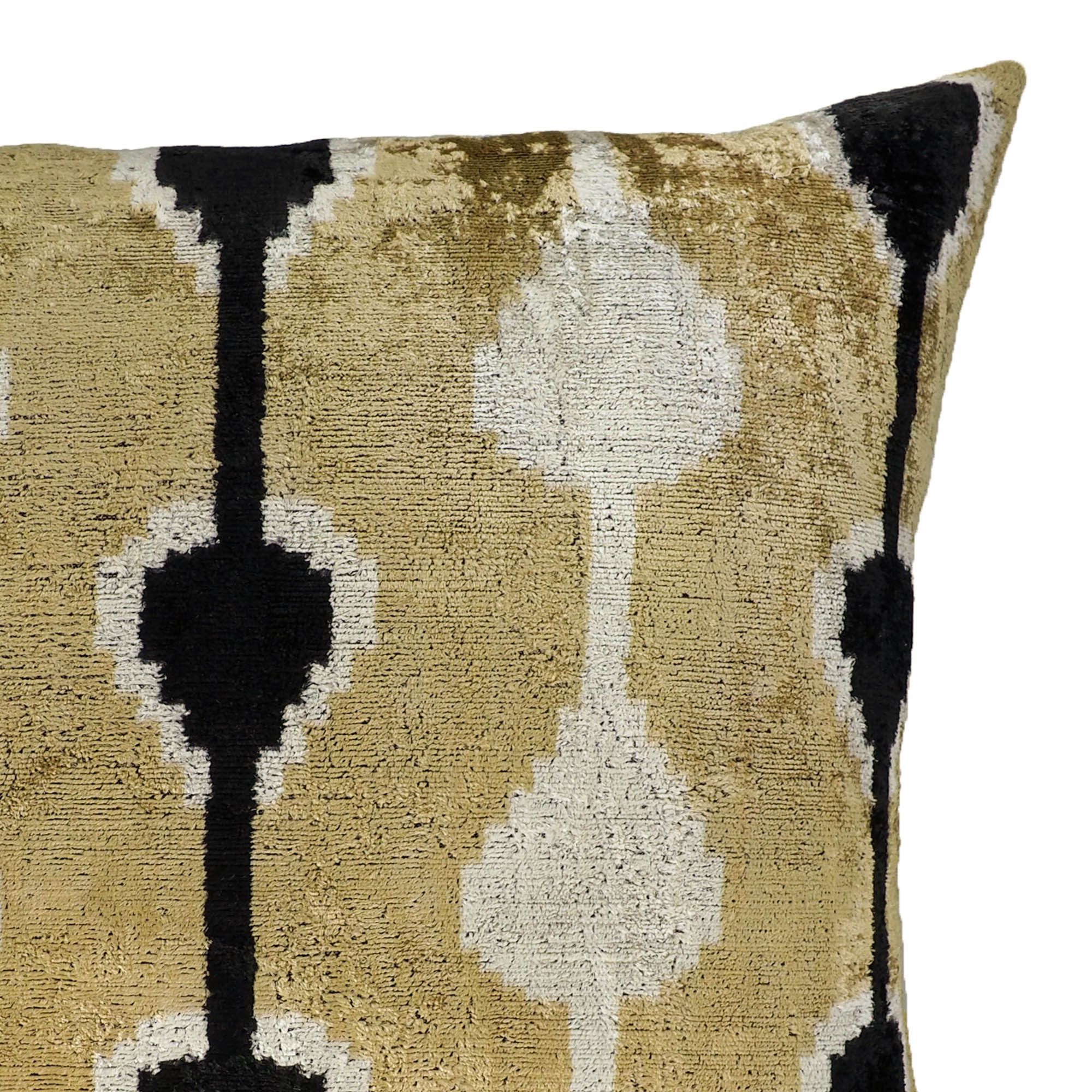 Luxury ikat throw pillow with symmetrical teardrop shapes in black and ivory on gold.