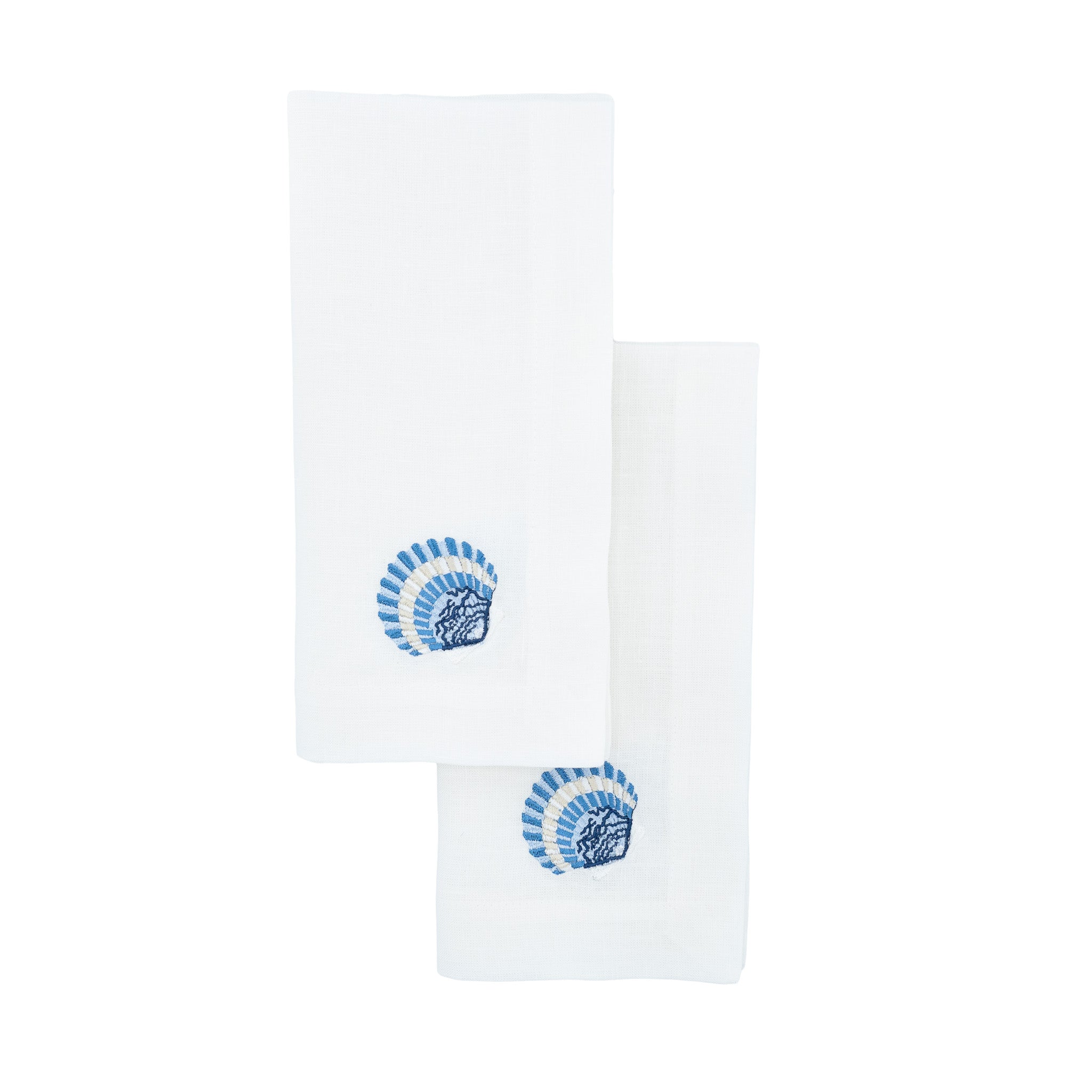 Linen napkins with blue shell designs, crafted to bring a fresh and sophisticated feel to your table settings.