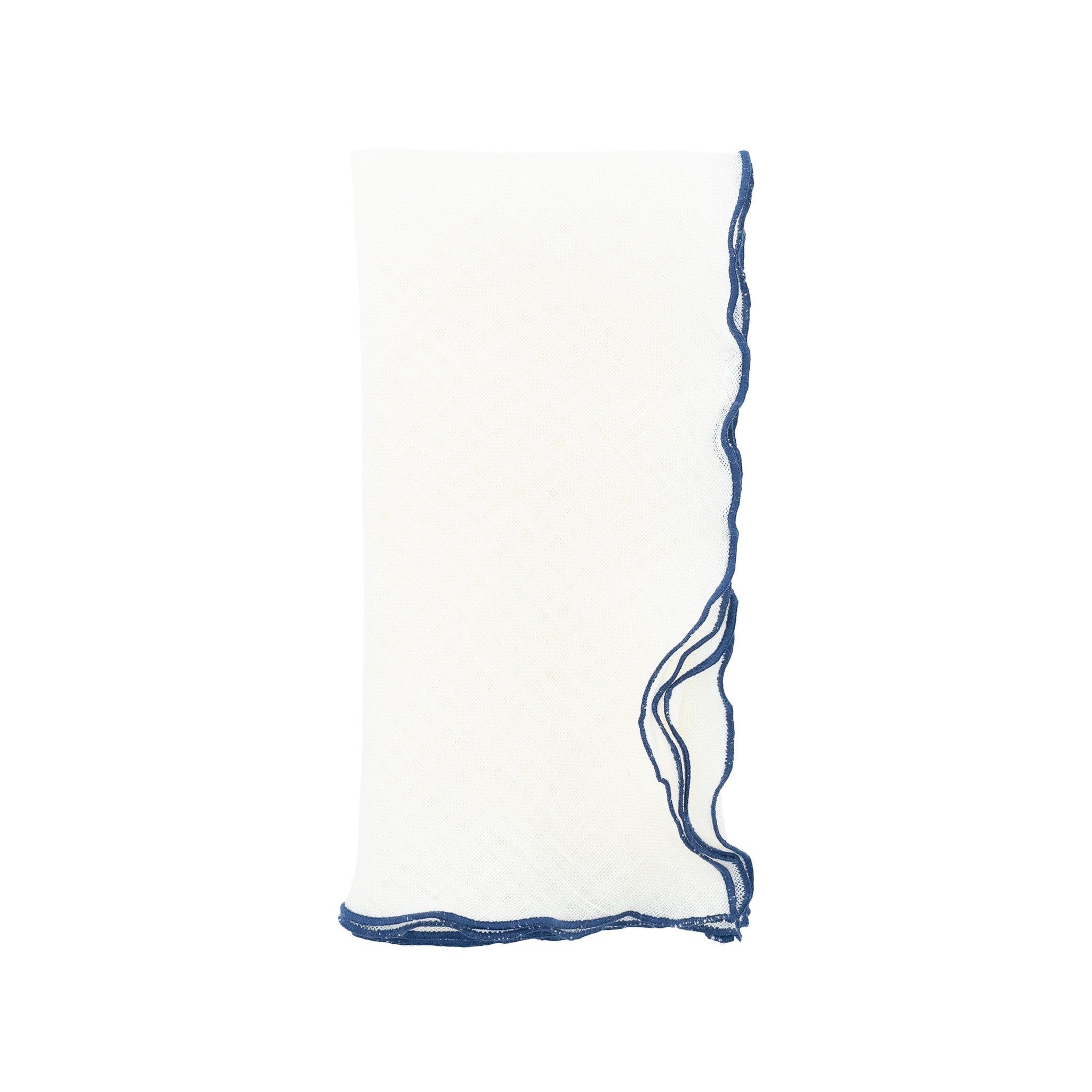 Luxurious linen napkins with navy ruffled trim, designed for a sophisticated, tactile dining experience.