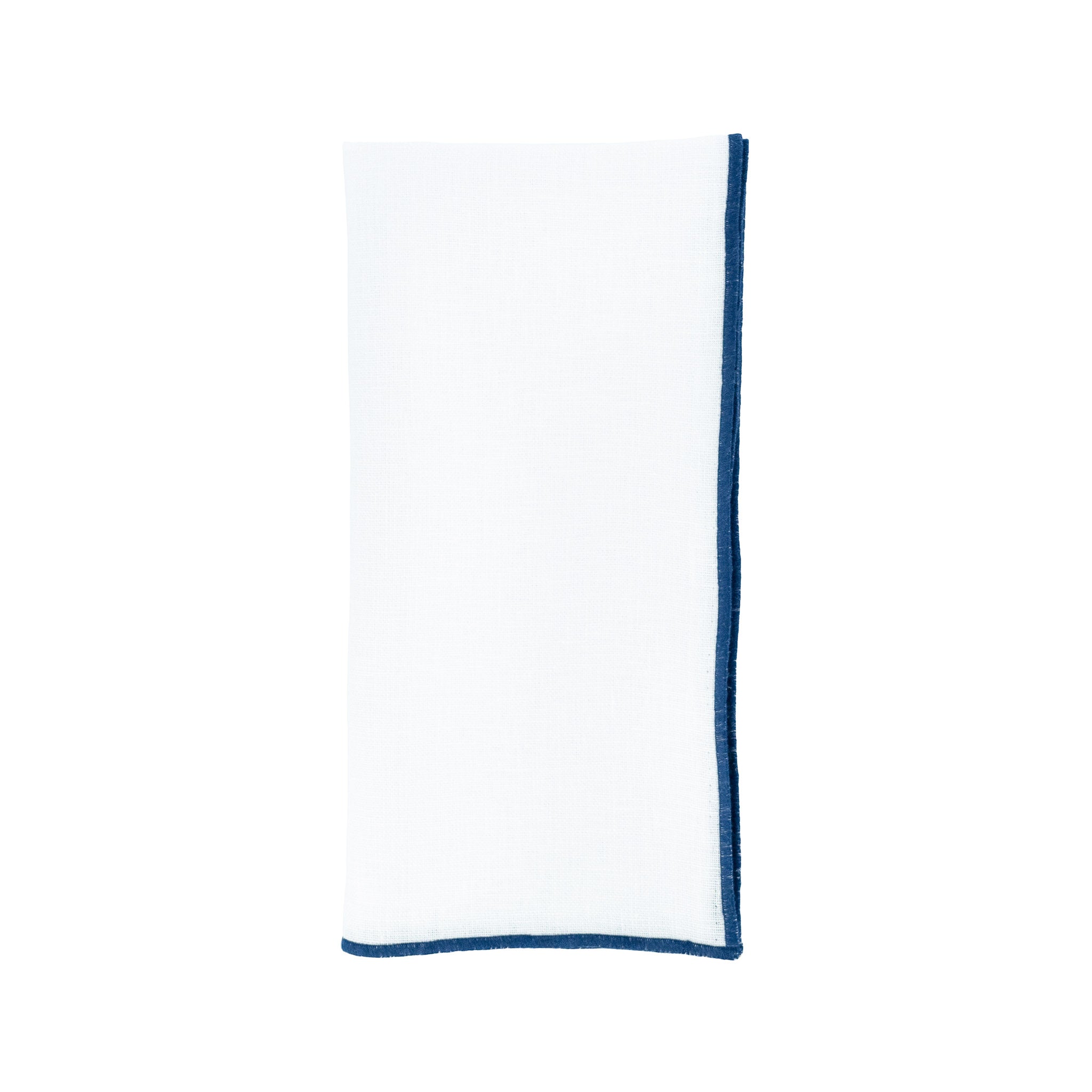 Linen napkins with navy stitch detailing, handmade for lasting quality and charm.