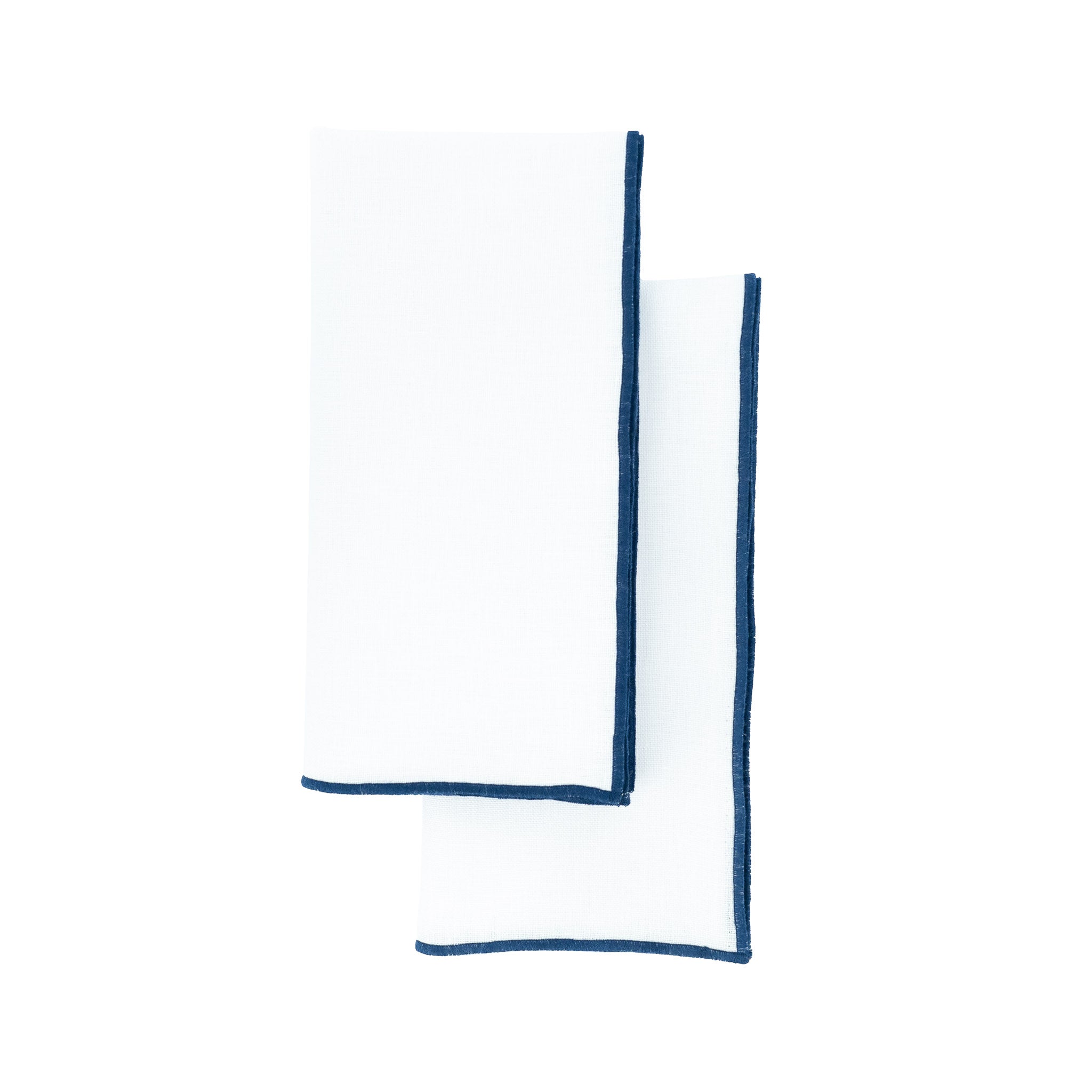 Linen napkins with navy stitch edges, crafted to bring a touch of sophistication to your table settings.