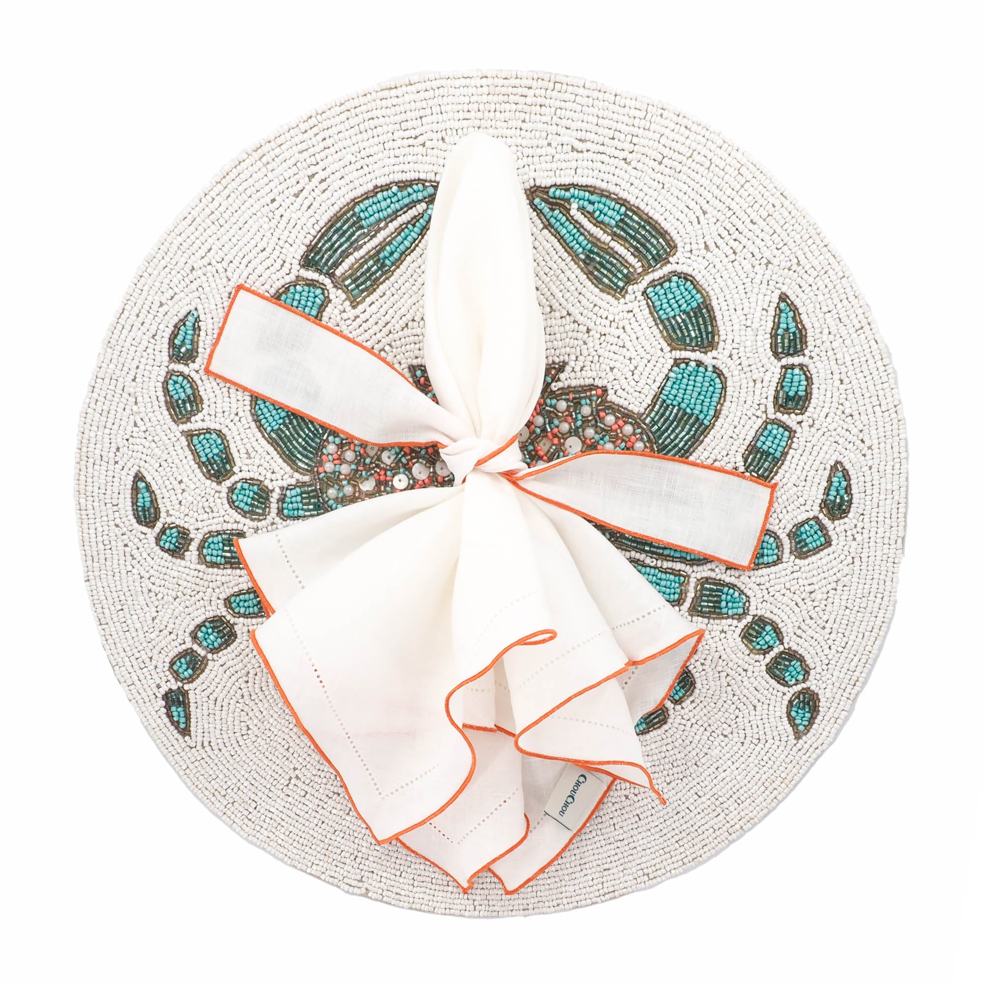 Elegant white linen napkins with orange ruffled hemstitch detailing, handmade for lasting quality and charm.