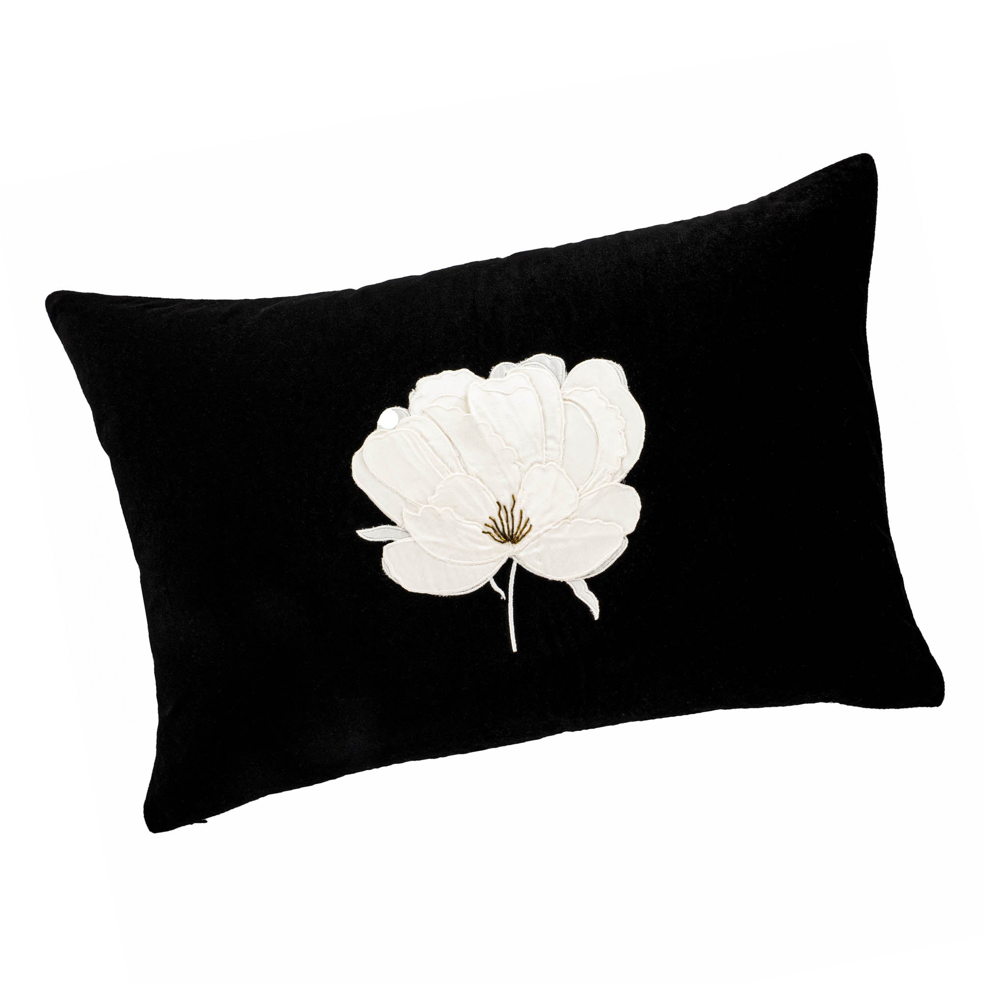 Luxury decorative pillow in black velvet with intricately stitched white lotus flower.