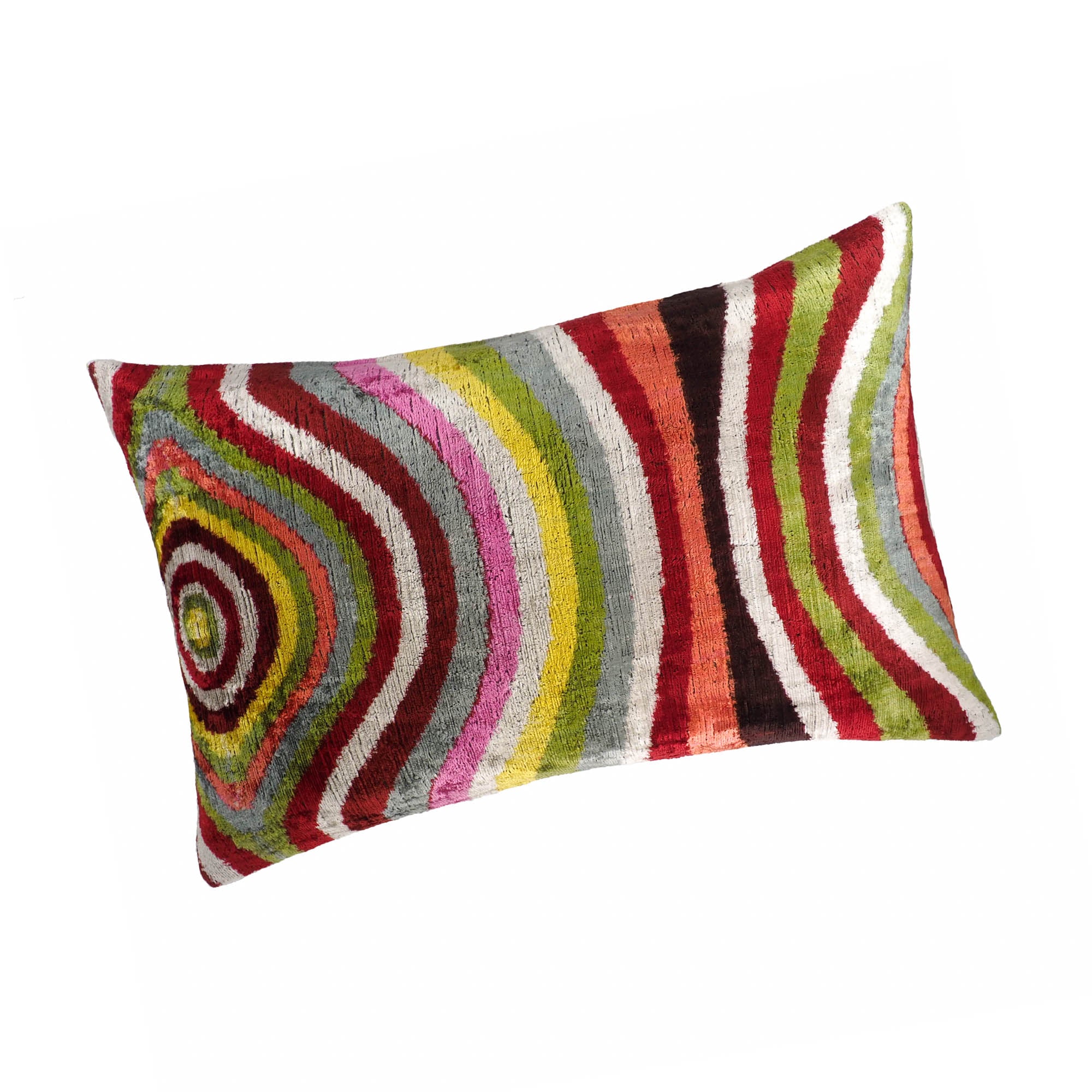 Chouchou Touch rectangular ikat pillow in vibrant rainbow swirl design.
