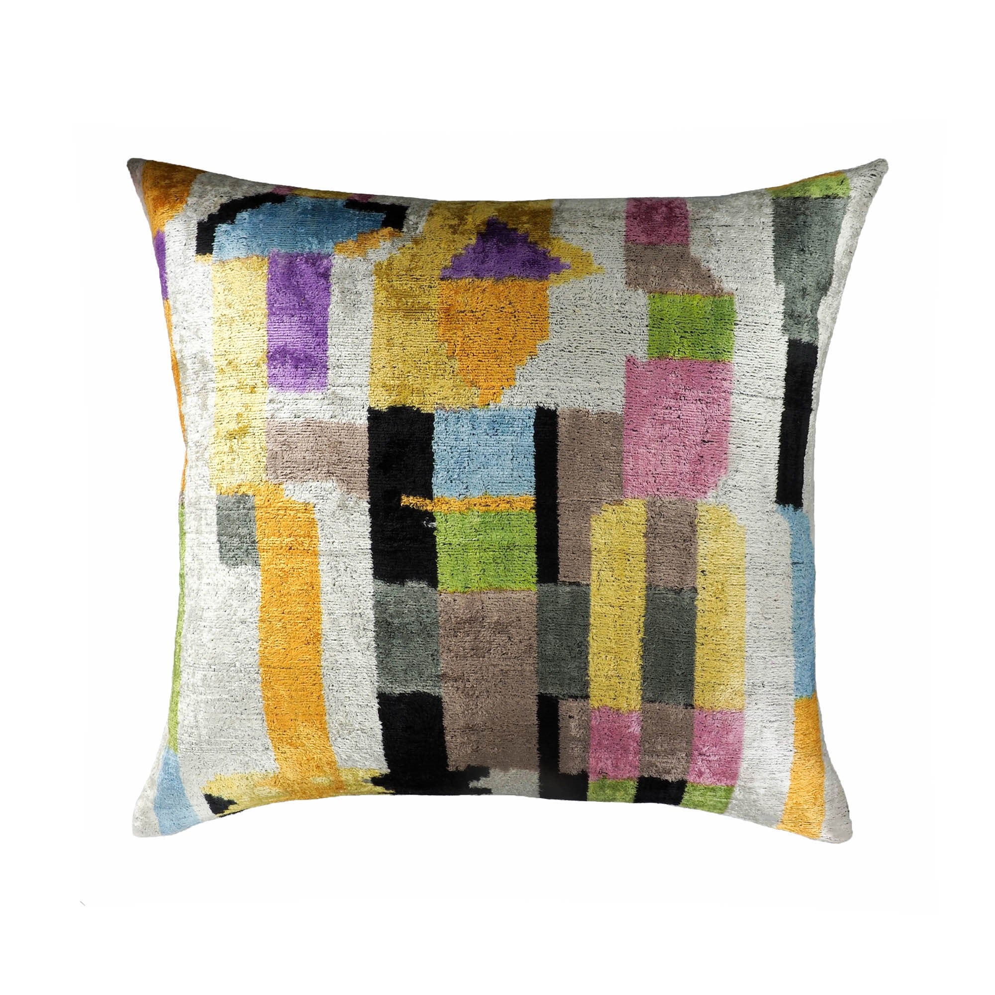 Large square silk velvet pillow with multicolor abstract ikat design in purple, yellow, green, and black.