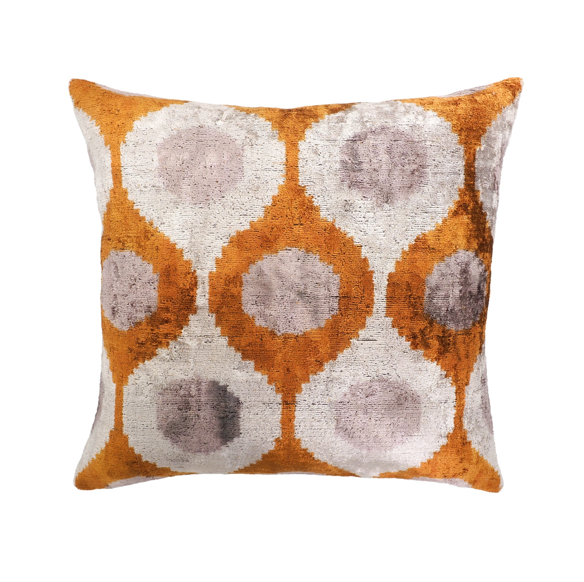 A square throw pillow featuring a textured ikat-style pattern of orange, beige, and gray interlocking circles, shown against a plain white background.