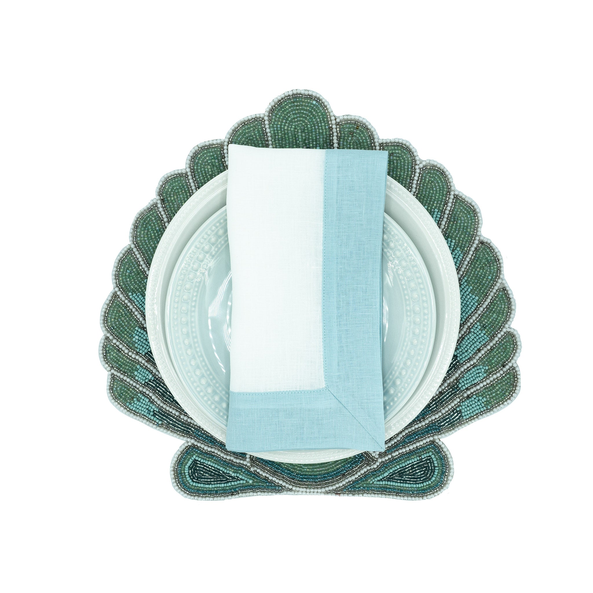 Set of 4 mint linen napkins, 21x21 inches, crafted for an elegant and fresh dining experience.