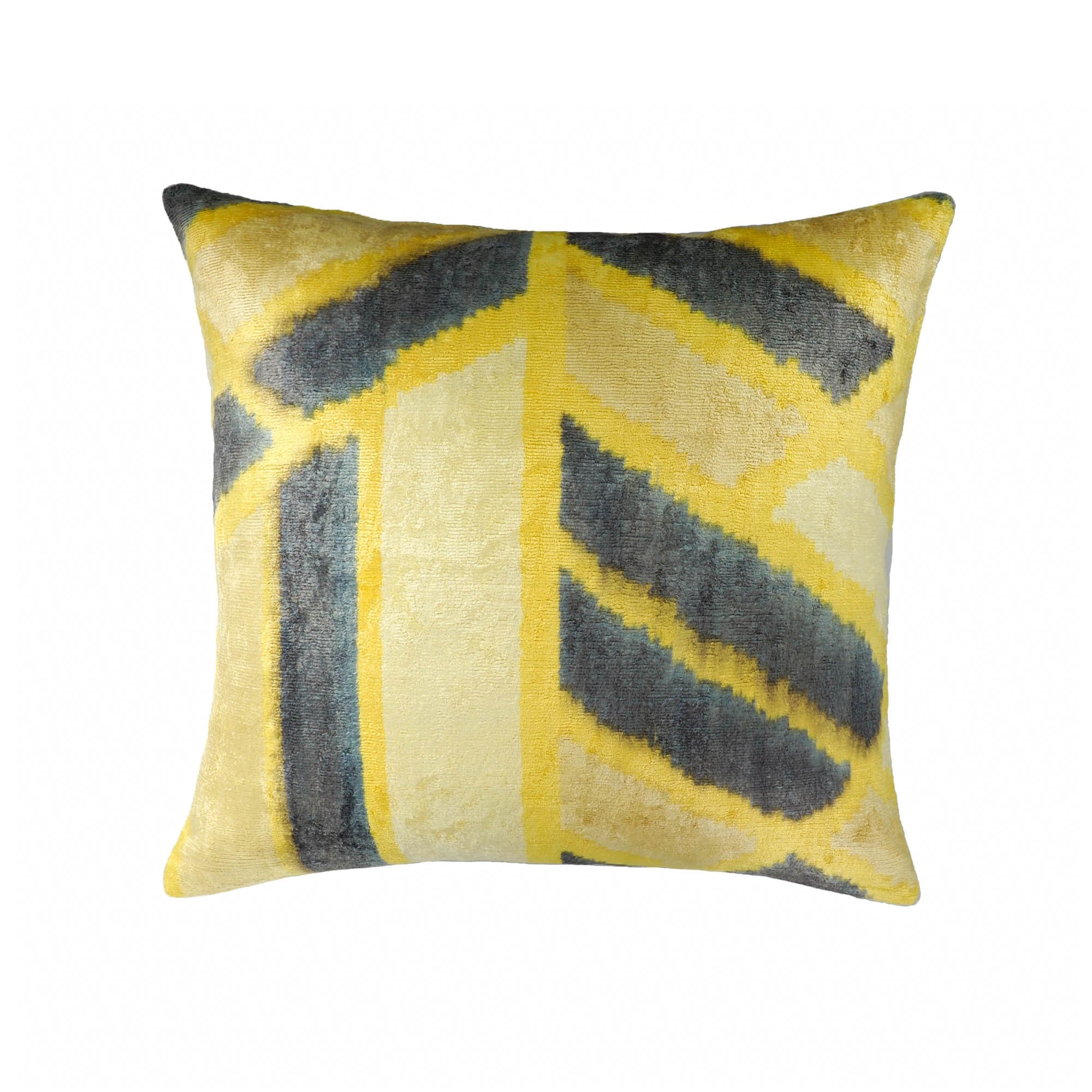 Mohawk silk velvet ikat pillow with bold yellow and charcoal gray chevron-style patterns.