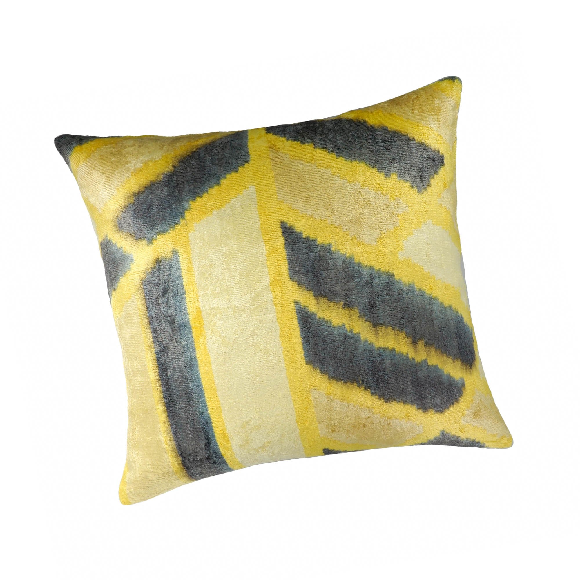 Square throw pillow in vibrant yellow silk velvet with geometric black and gray ikat design.
