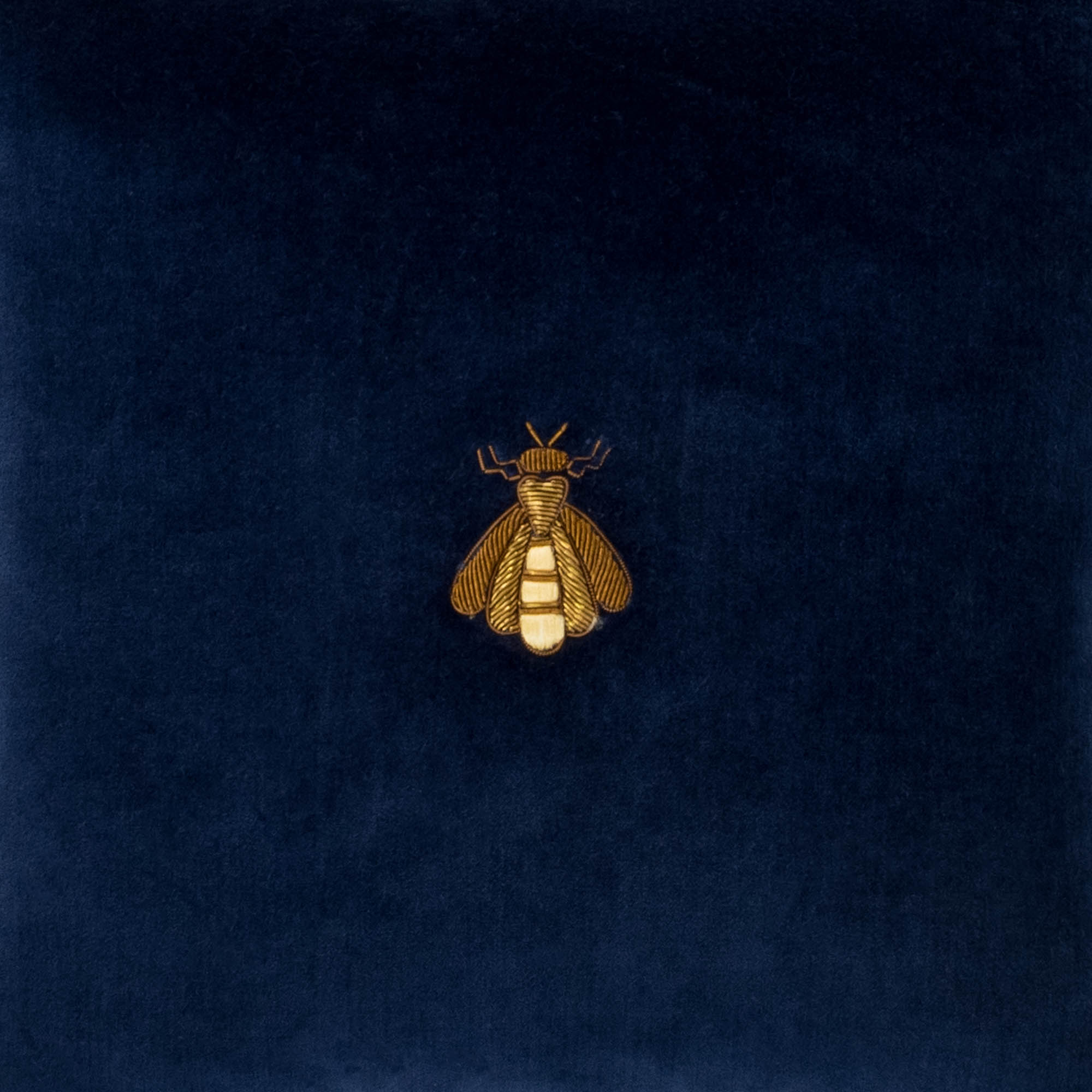 Chouchou Touch Navy Bee Throw Pillow Cover, 12" x 12", crafted from silk velvet and adorned with hand-embroidered golden bee motif.