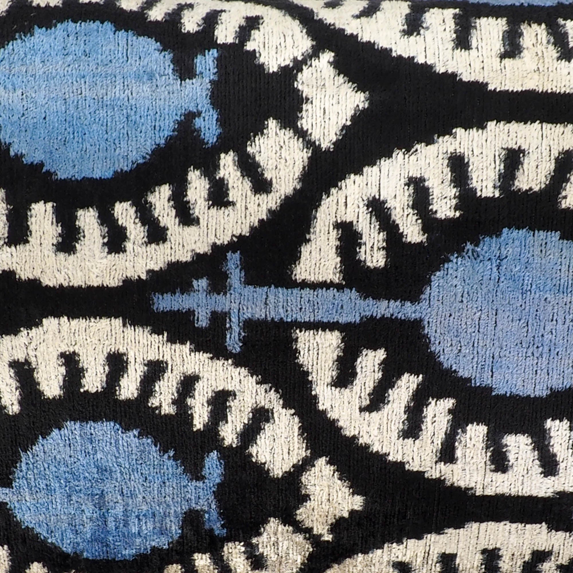 Oasis Silk Velvet Ikat Throw Pillow, 16 x 24, bringing together rich silk velvet and traditional Ikat weaving for a stunning, textured accent piece.