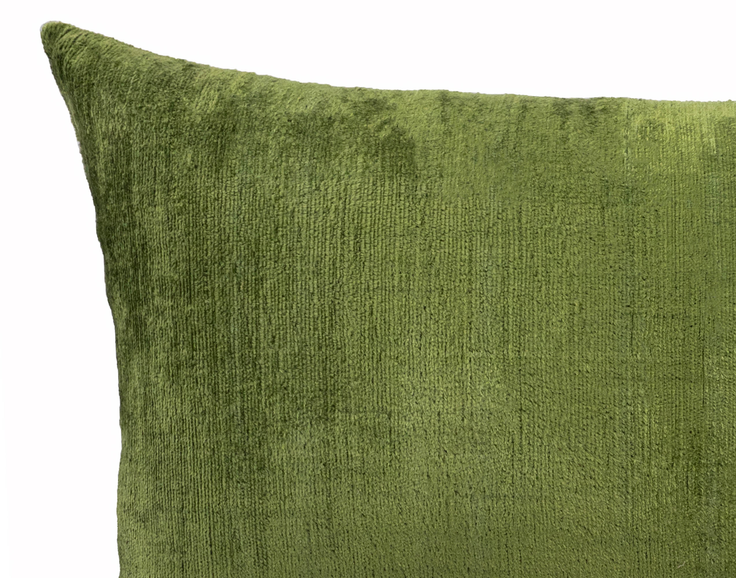 Rectangular silk velvet throw pillow cover with olive ikat pattern and smooth texture.