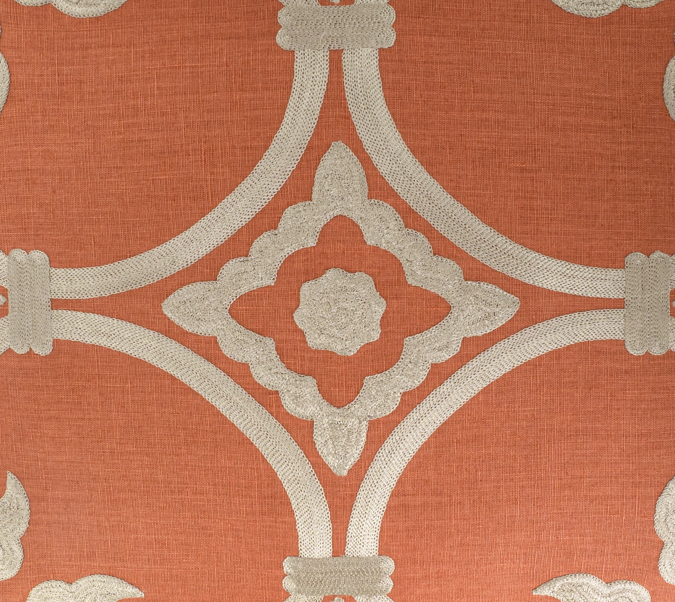 orange linen pillow with natural embroidery from the Palazzo Collection by ChouChou Touch on a detail look of fabric