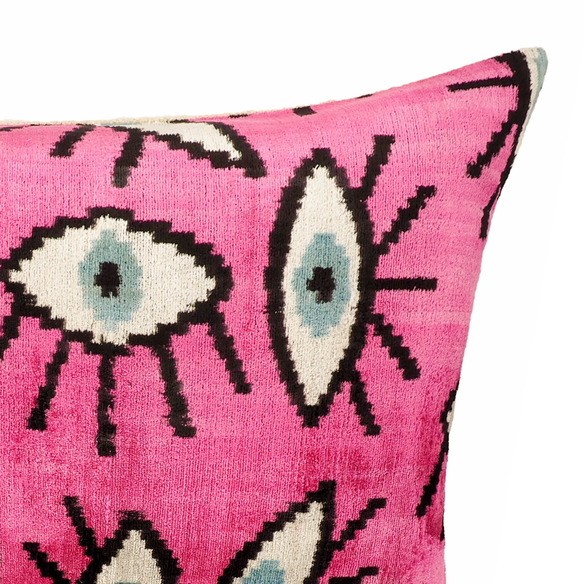 Chouchou Touch Pink Eyes Silk Velvet Ikat Pillow Cover, 16 x 24, with detailed pink Ikat weaving on smooth silk velvet, creating a luxurious and colorful centerpiece for your home.