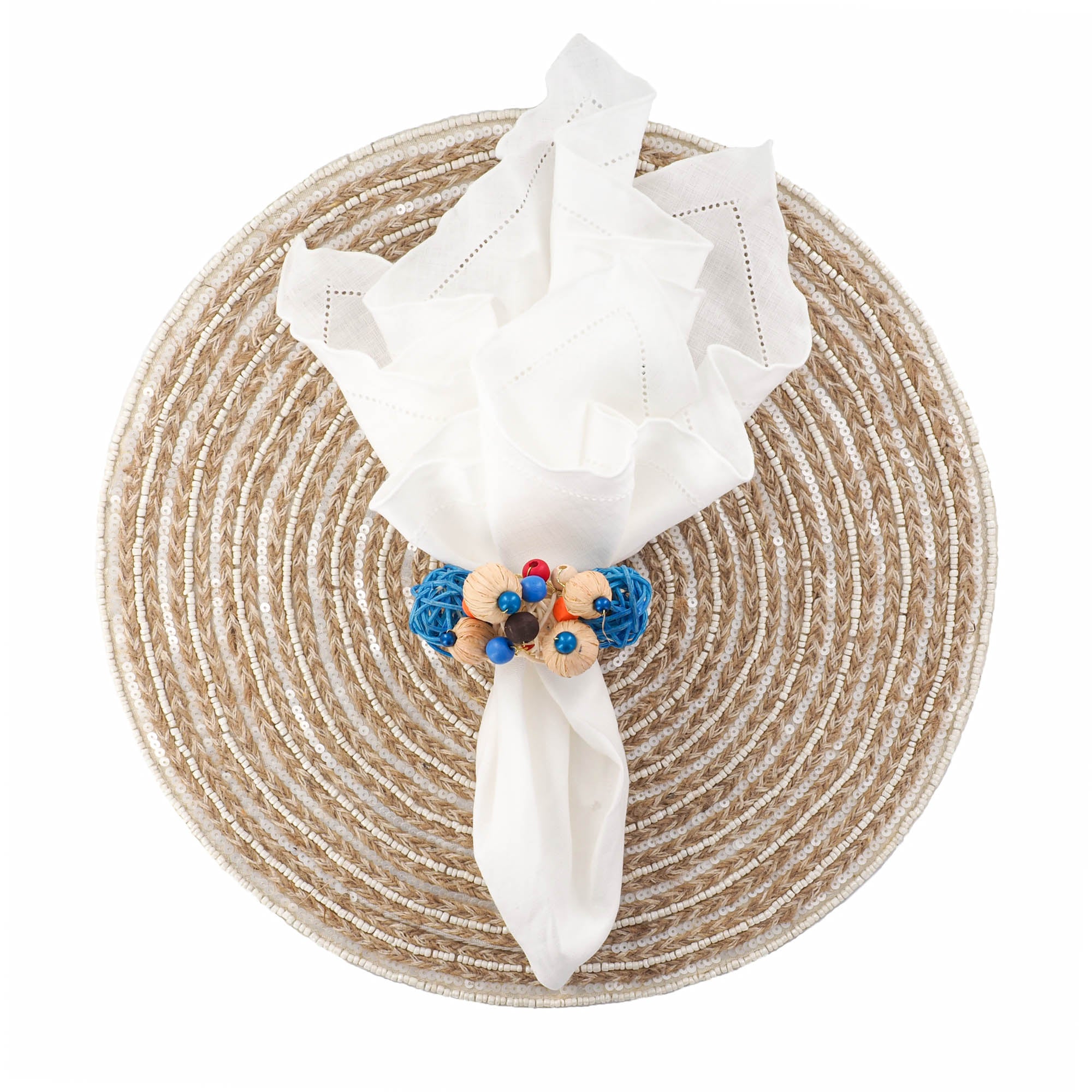 Handmade braided jute placemat with white and ivory glass bead detailing on a white background by ChouChou Touch