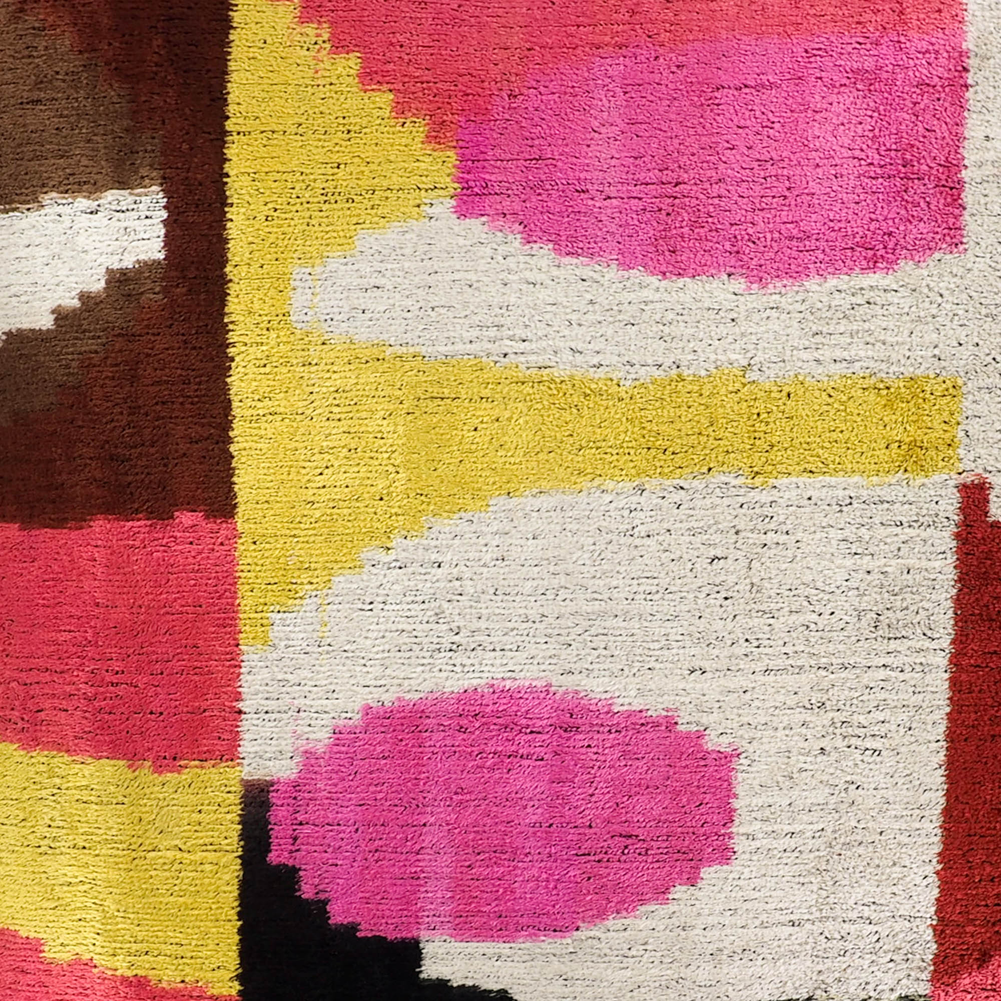 Rio Rio Silk Velvet Ikat Throw Pillow Cover, 20 x 20, with colorful, handwoven Ikat designs on soft silk velvet fabric, offering a chic, luxurious touch to your sofa.