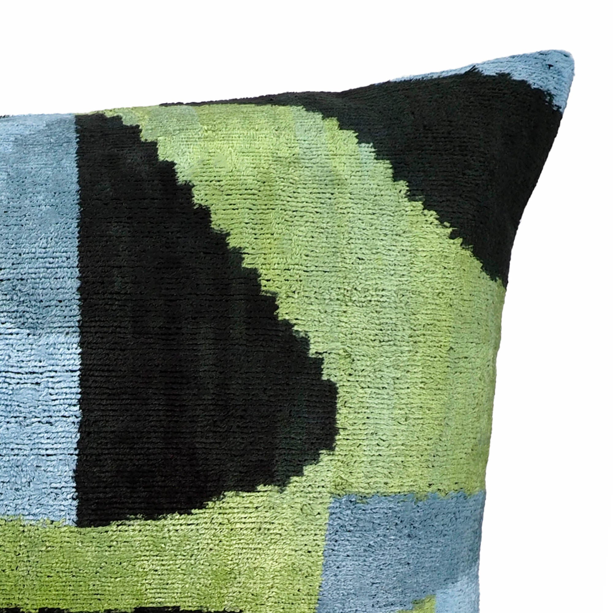 Chouchou Touch Robin Ikat Throw Pillow Cover, 16 x 24, featuring vibrant, handwoven Ikat designs on soft silk velvet, a stunning addition to any modern interior.
