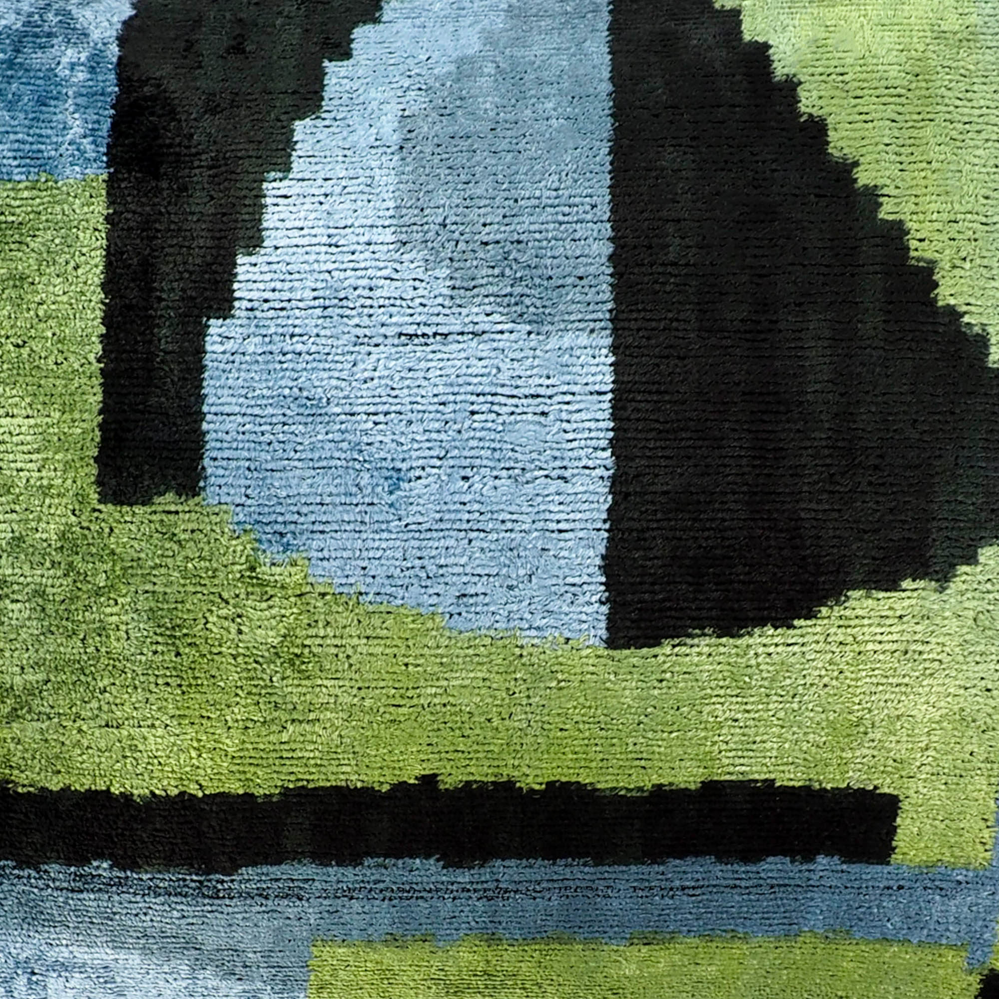 Robin Silk Velvet Ikat Throw Pillow Cover, 16 x 24, blending centuries-old Ikat weaving traditions with contemporary silk velvet, creating a timeless home accent.
