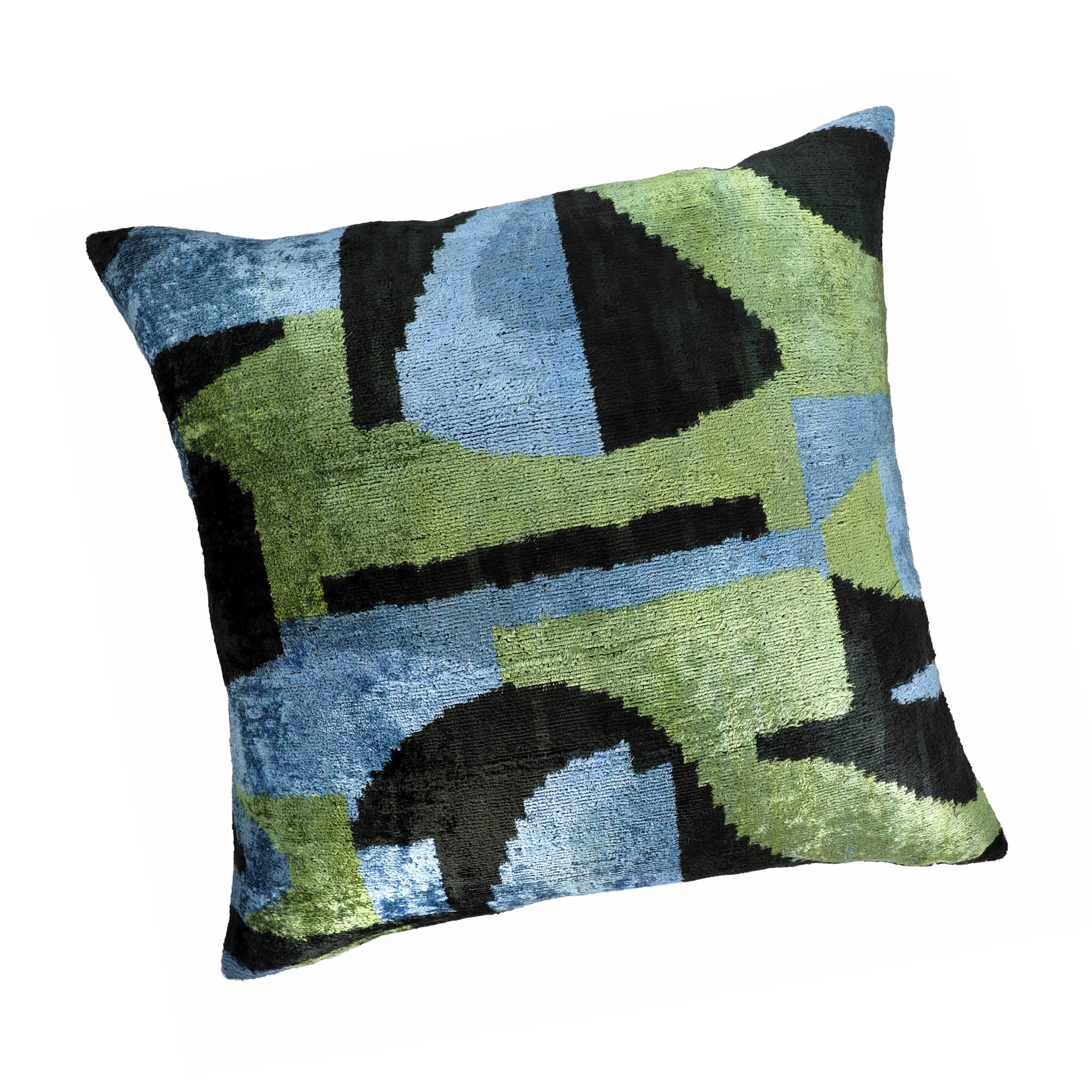 Chouchou Touch velvet ikat pillow with bold overlapping blocks in moss green, denim blue, and charcoal.