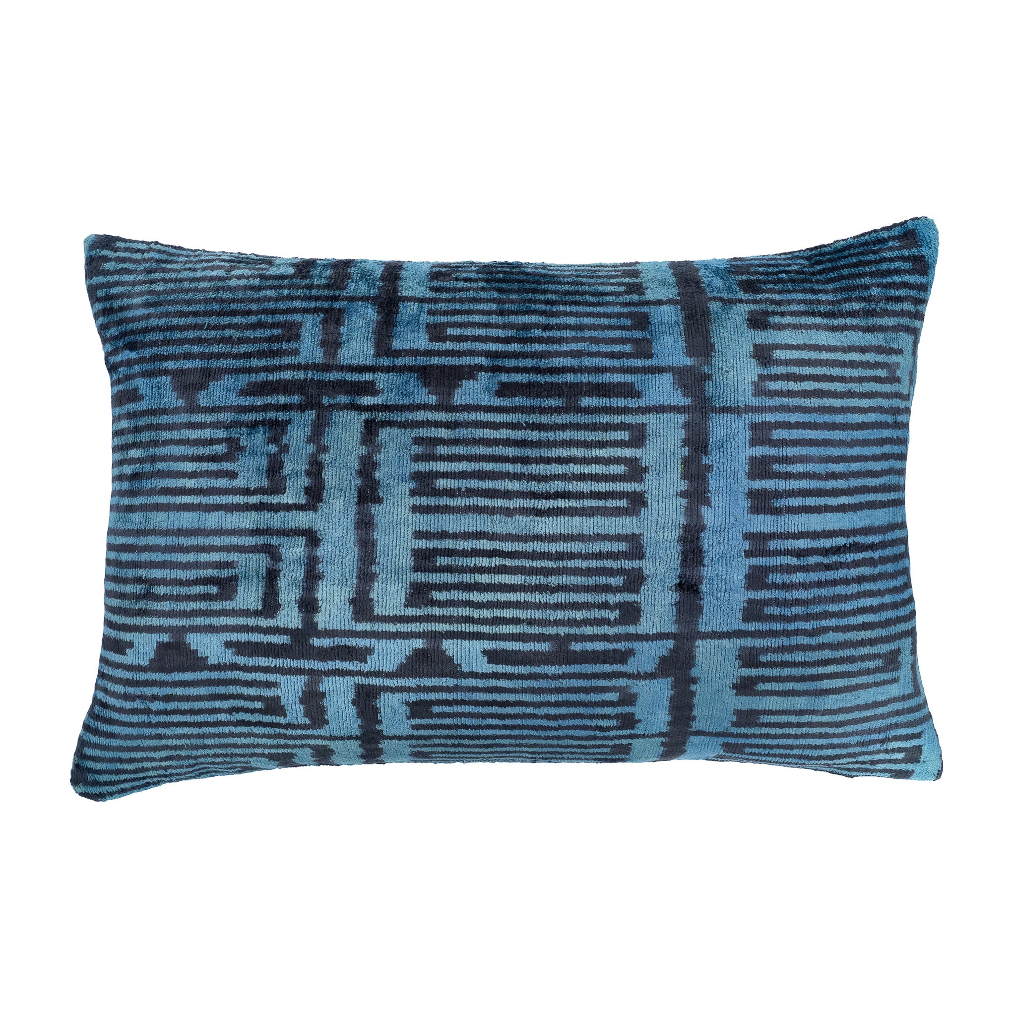 Skyline silk velvet ikat pillow in deep teal and navy with abstract linear pattern.