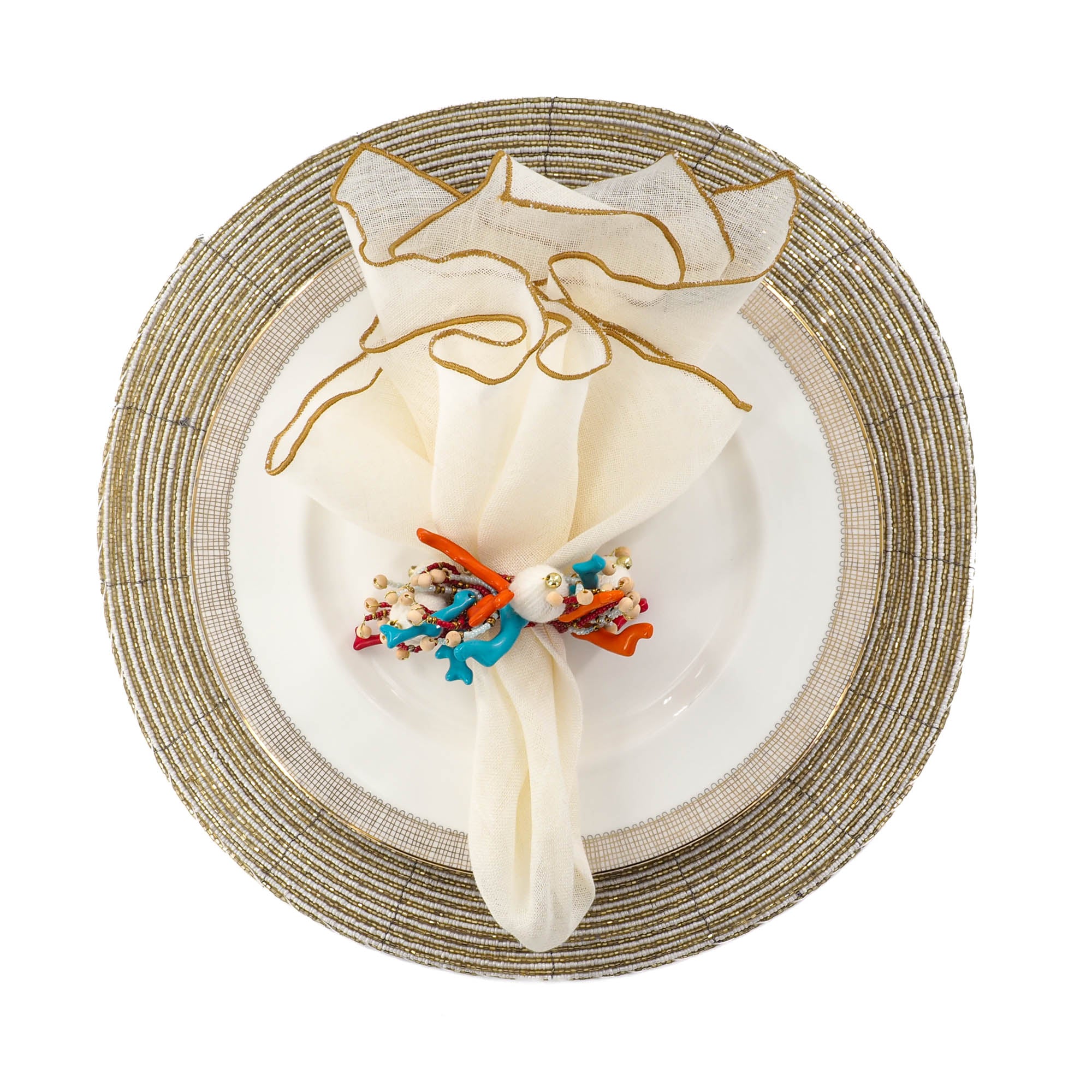 Handcrafted gold and white glass beaded placemat styled with elegant ivory linen napkin and bleu and orange ring by ChouChou Touch