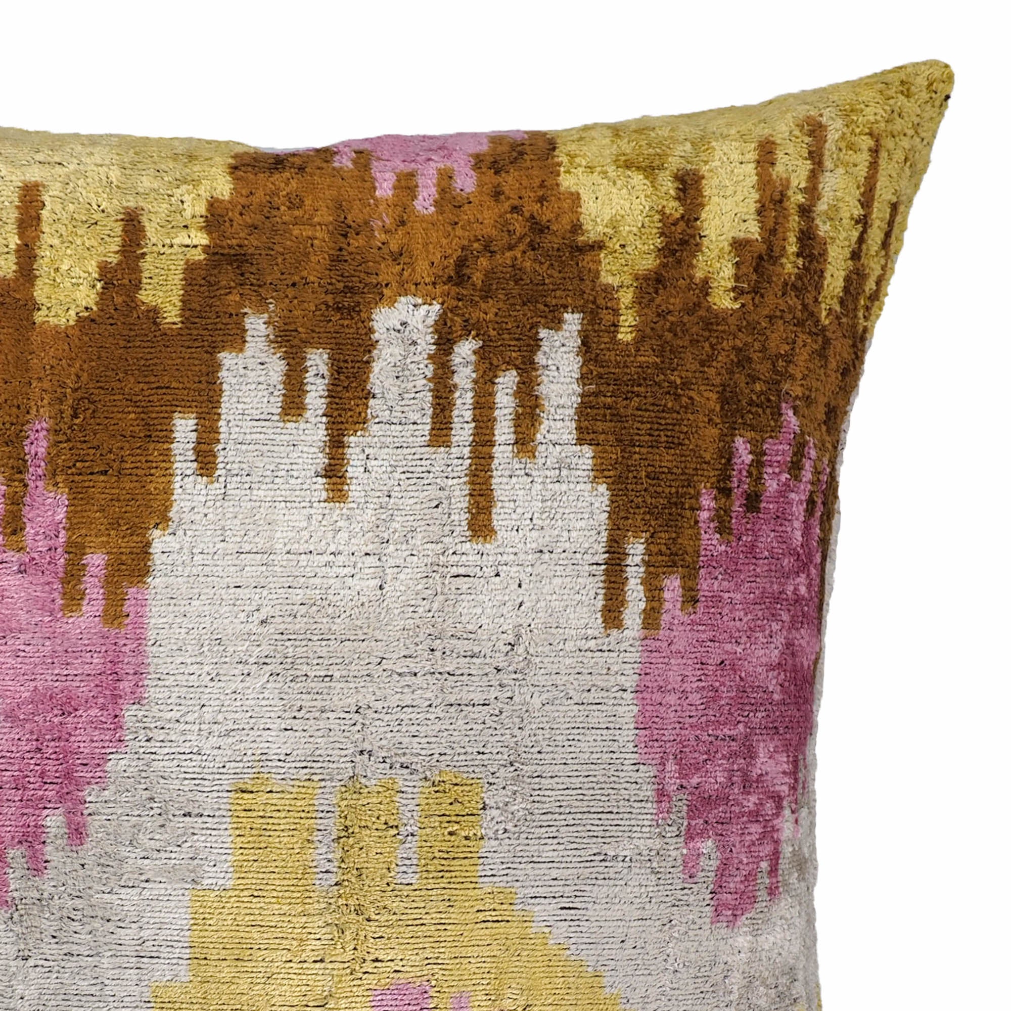 20-inch square silk velvet ikat throw pillow in sunset-inspired shades of pink and gold.