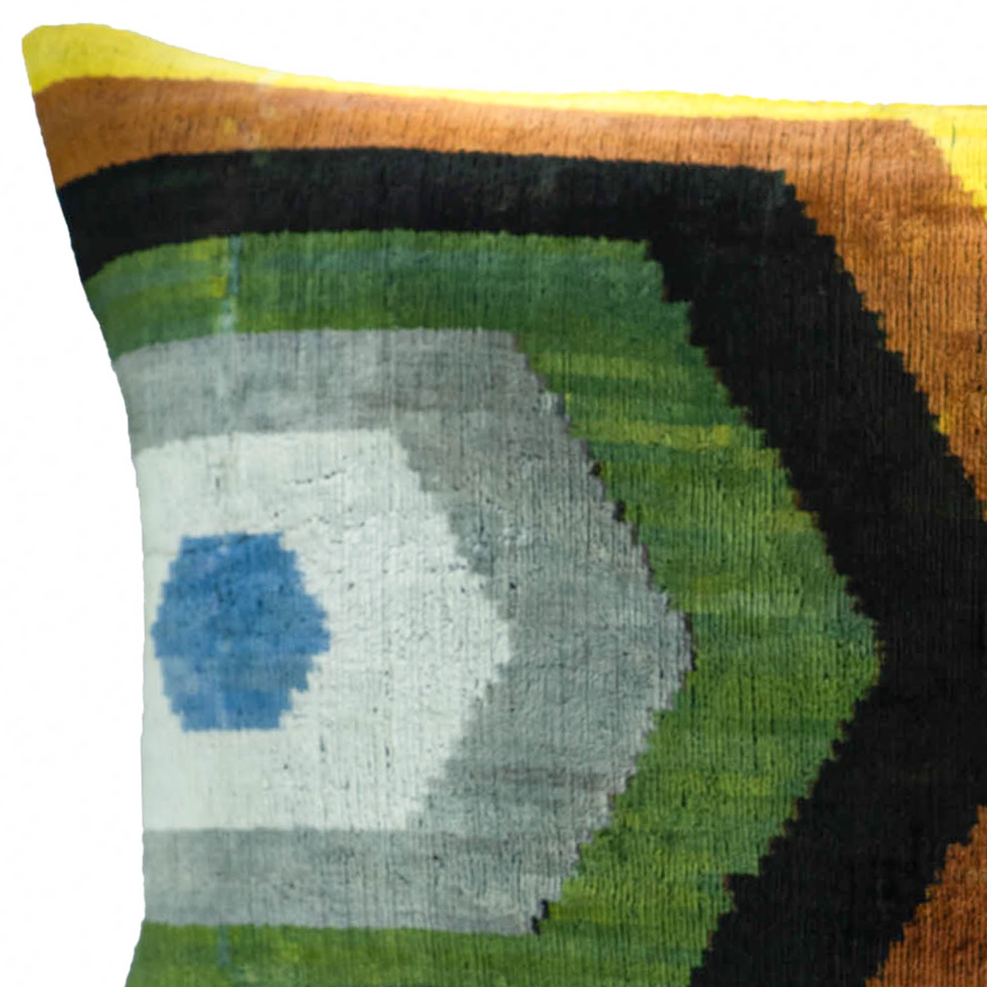 Chouchou Touch Trance pillow, made from soft silk velvet with intricate Ikat patterns in earthy colors.