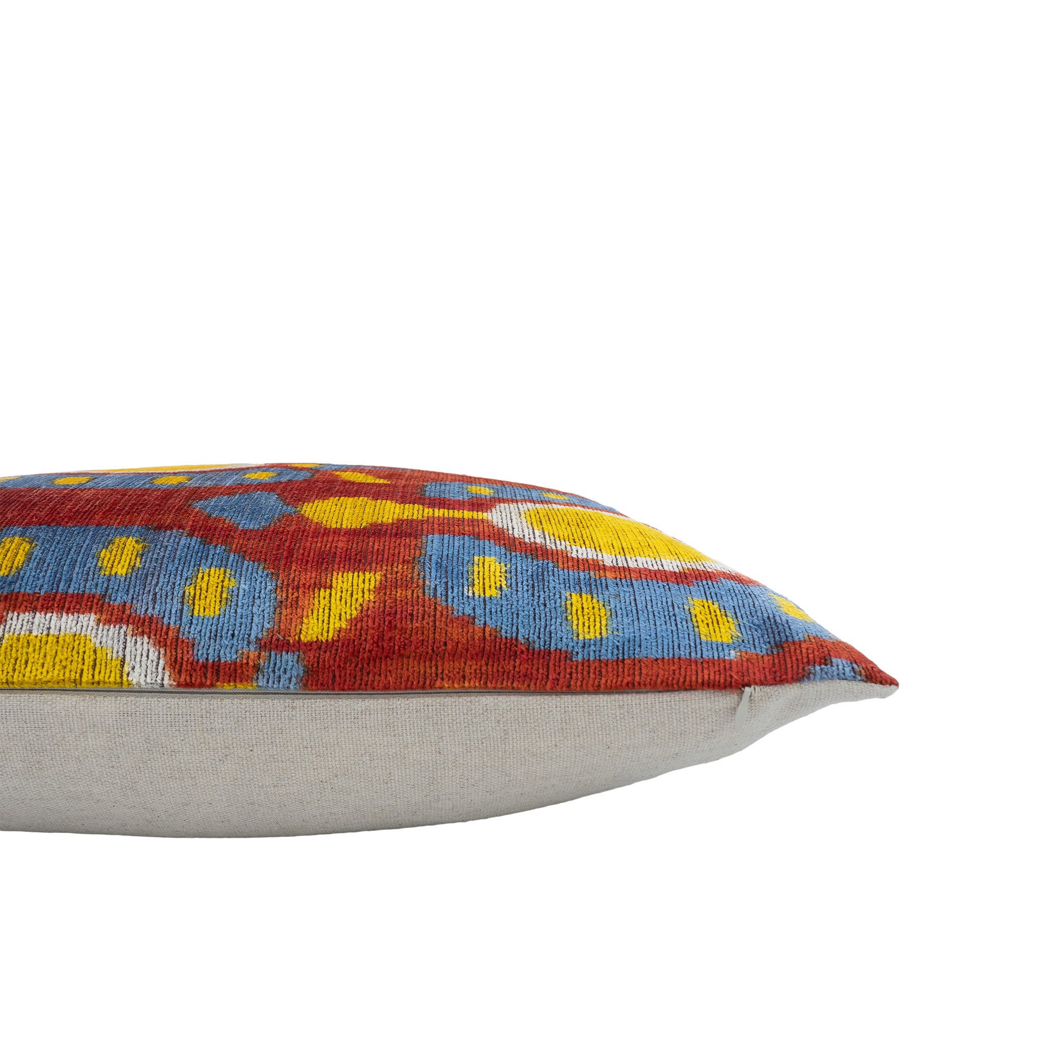 Handwoven 16x24-inch silk velvet ikat pillow cover featuring a traditional Uzbek pattern with modern hues.