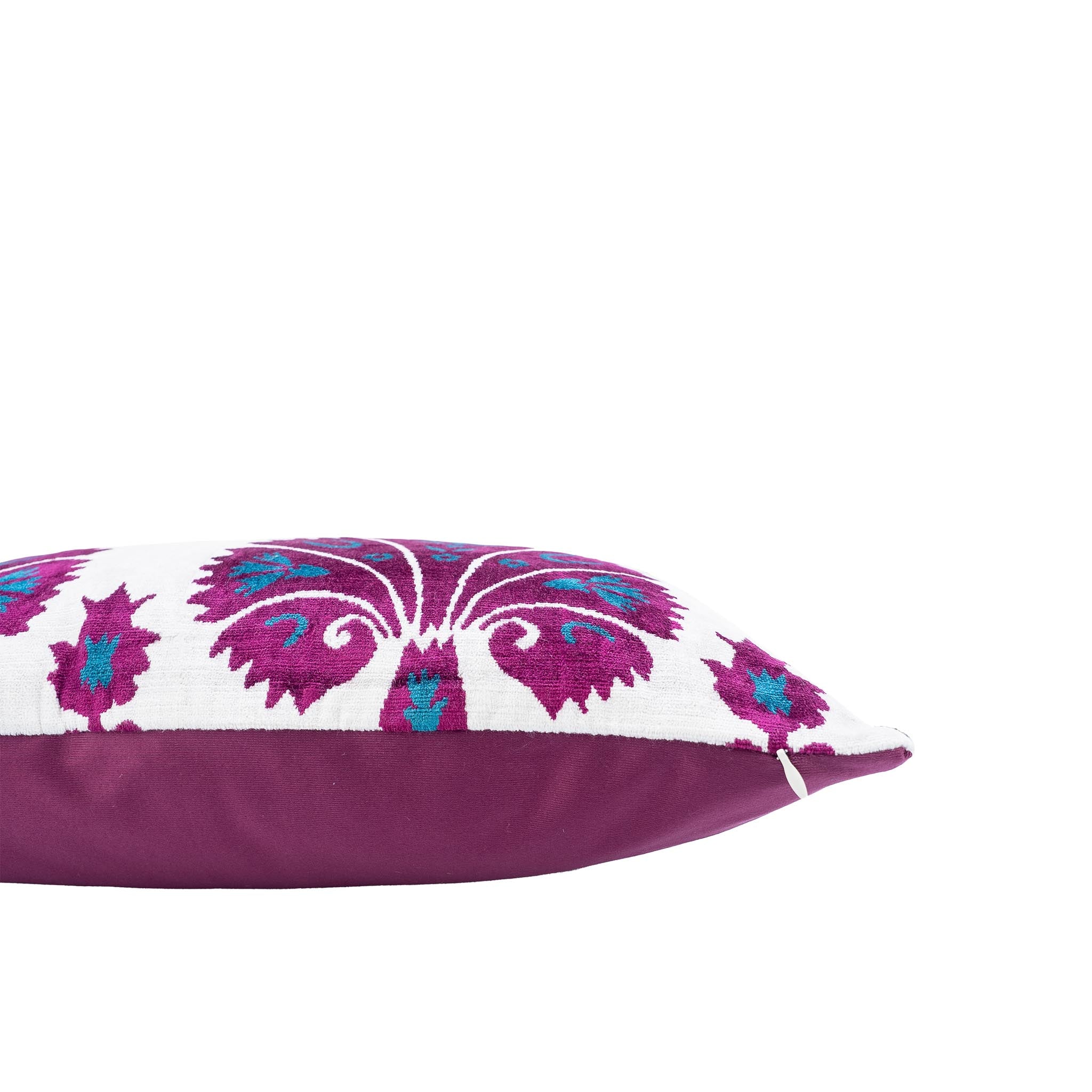 Handwoven silk velvet pillow with intricate Ottoman-inspired floral ikat patterns in purple and blue.