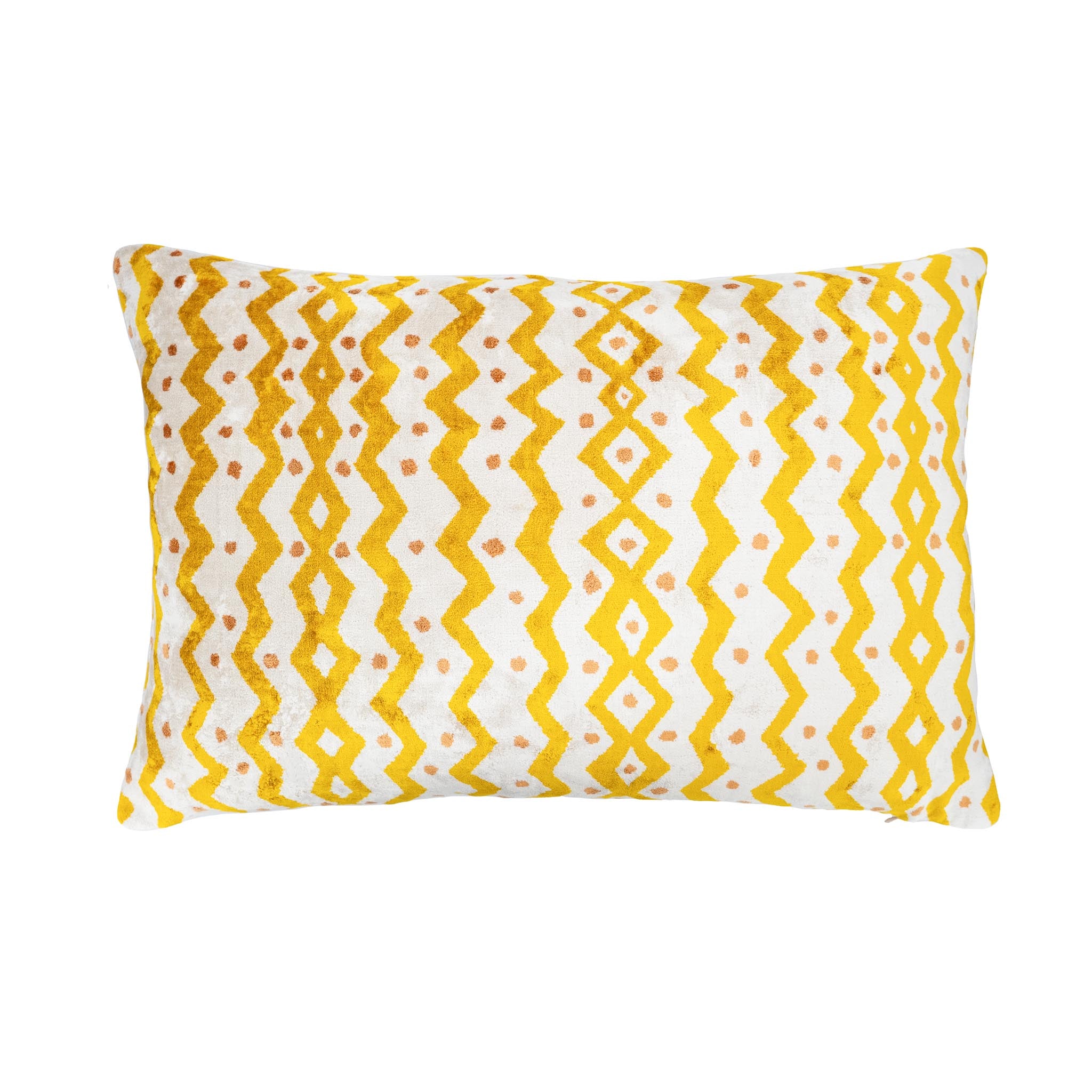 Rectangular yellow and white silk velvet ikat pillow with zigzag and diamond pattern.