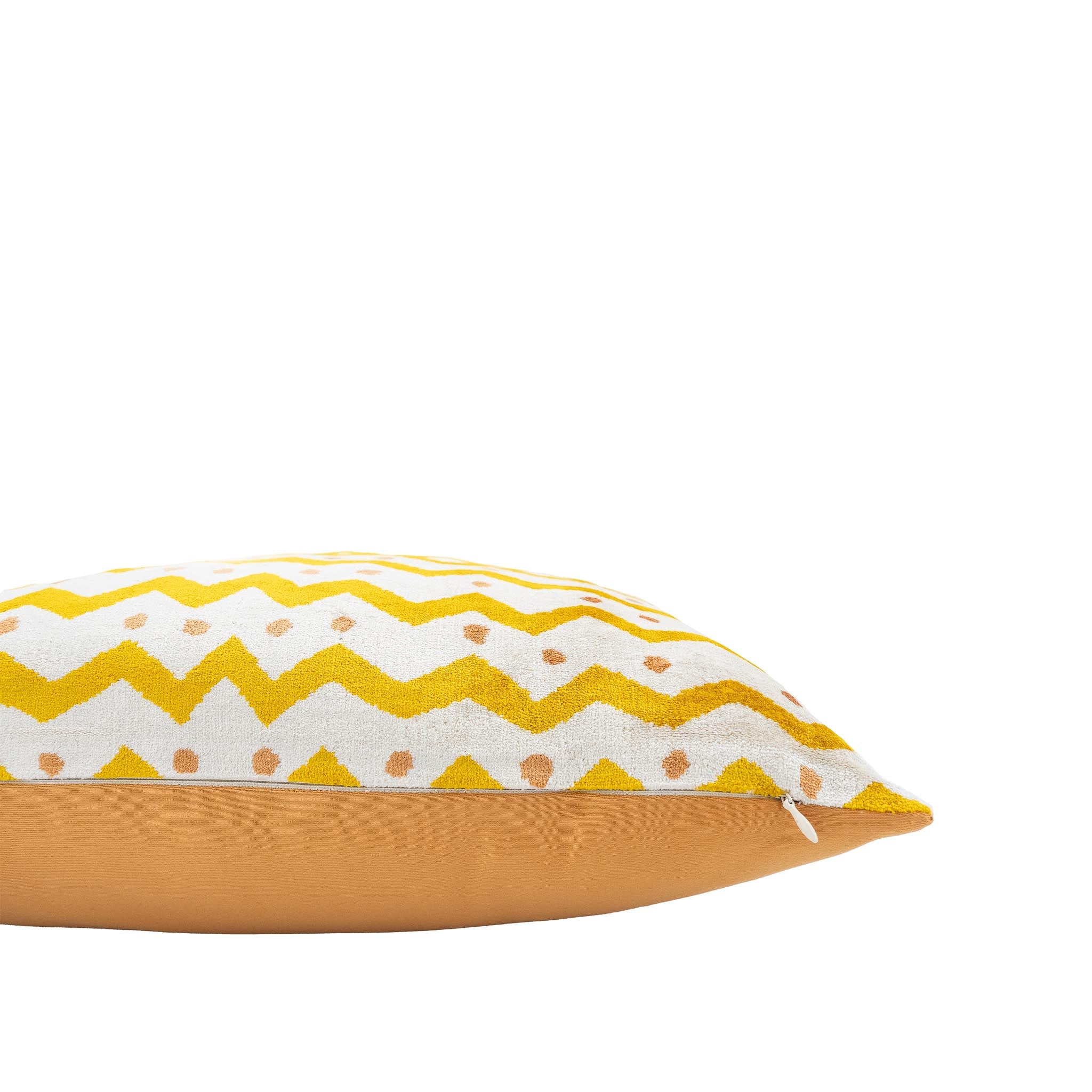 Bright and elegant Casablanca ikat pillow with golden yellow and beige geometric motifs.