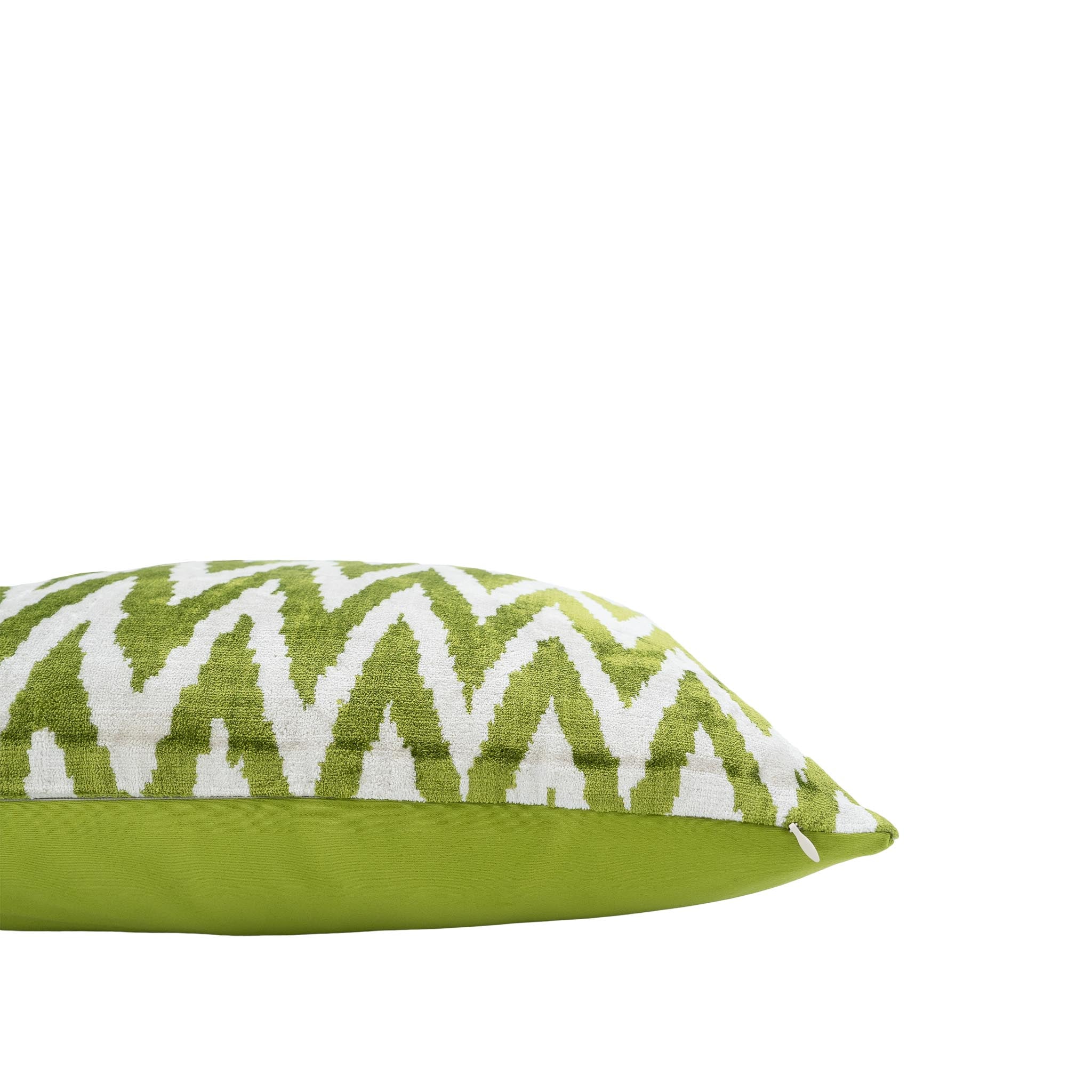 Handwoven silk velvet pillow cover with a vibrant green chevron ikat design, 20-inch square.