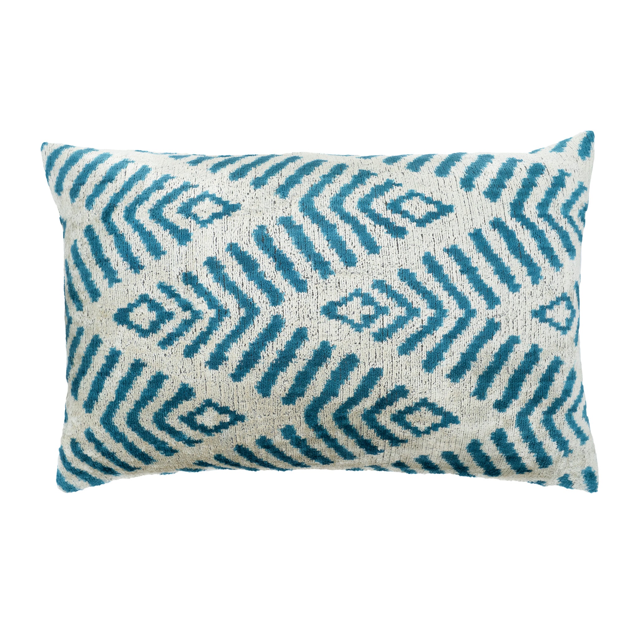 Handmade coastal blue silk velvet ikat pillow cover with geometric pattern in aqua blue and ivory, luxury decorative lumbar throw pillow for coastal and bohemian interiors.
