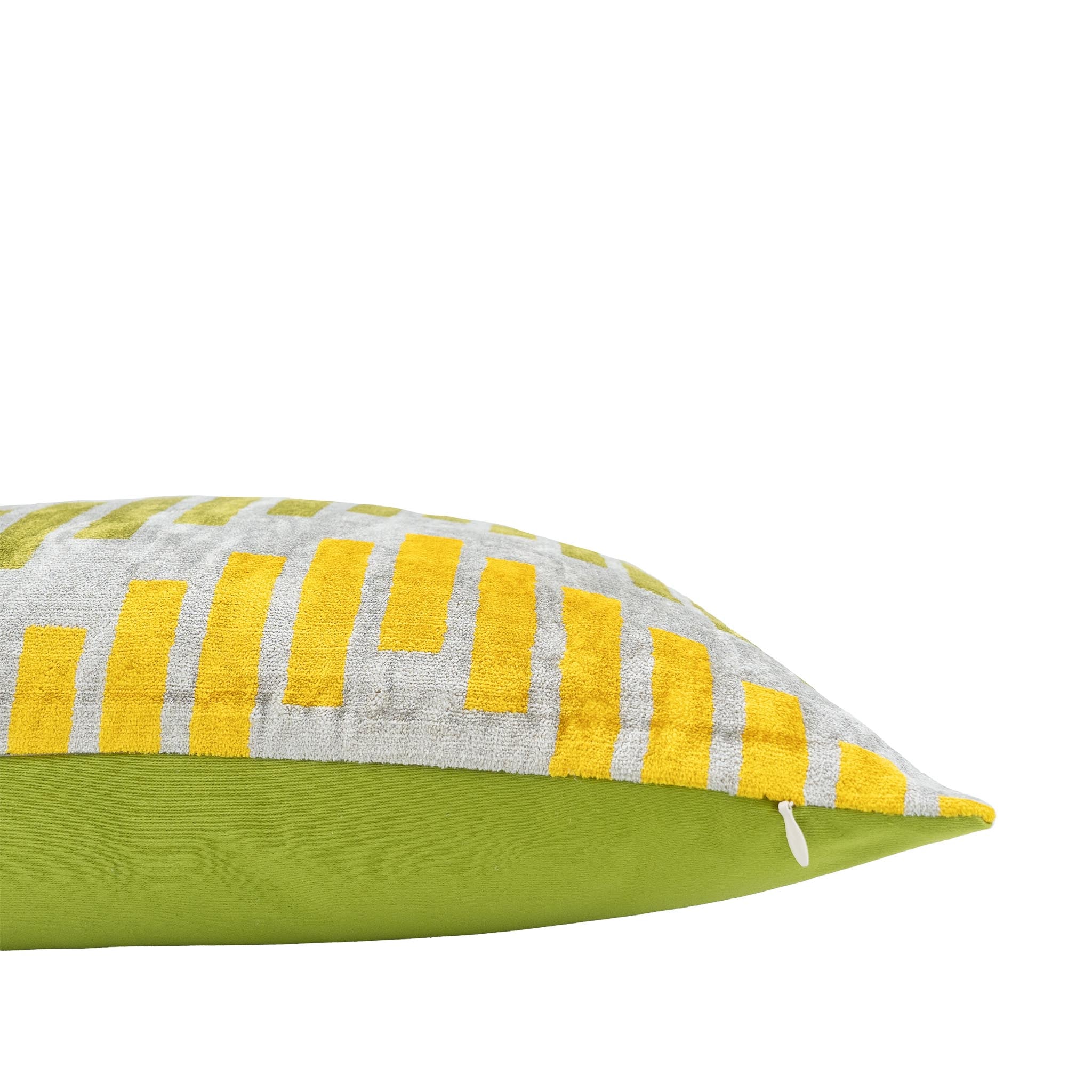 Luxurious decorative pillow with a contemporary green and yellow ikat pattern, crafted from pure silk velvet.