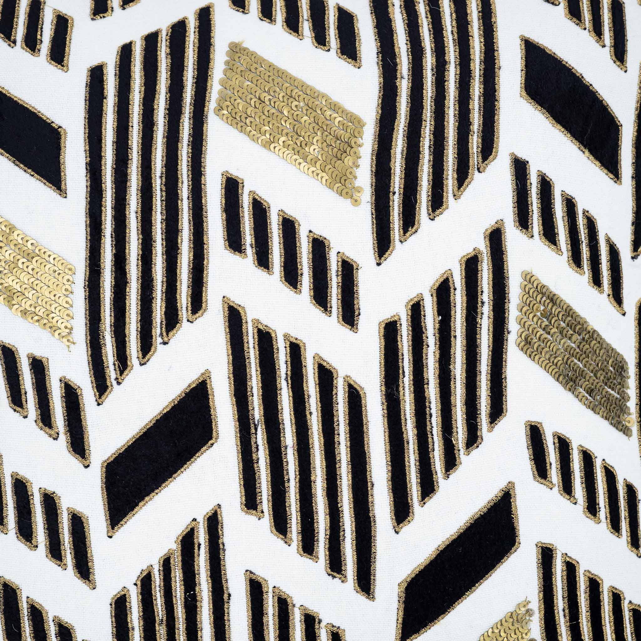 Chouchou Touch throw pillow with metallic embroidery and chevron sequin design.