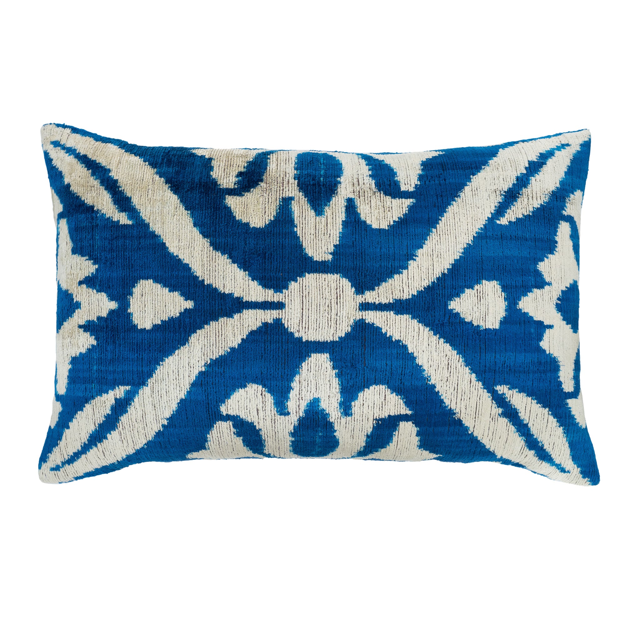 Isabella ikat pillow with bold royal blue and ivory floral medallion design.